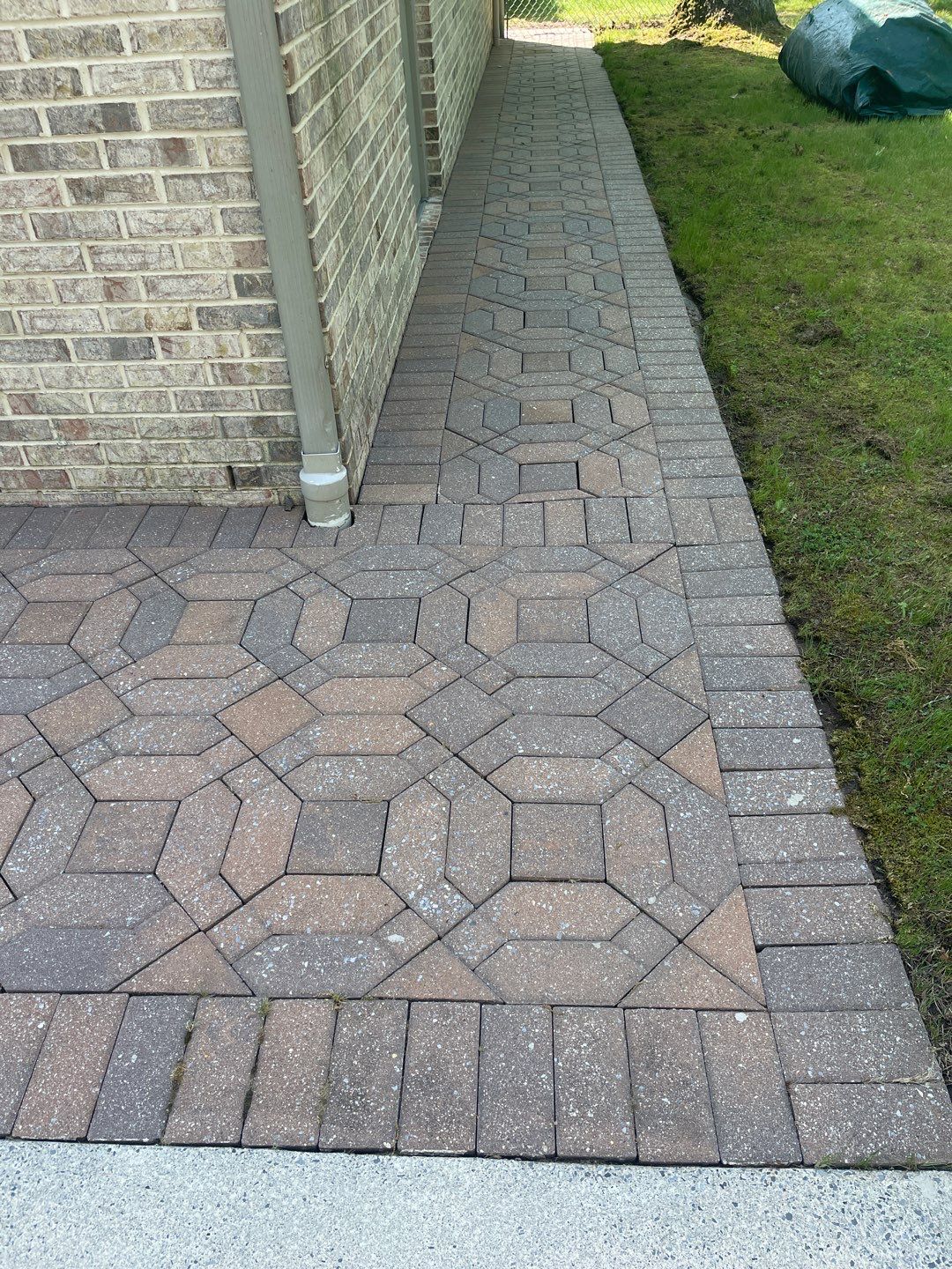 Pavers Cleaned, Garage and Concrete walls by SJ Exterior