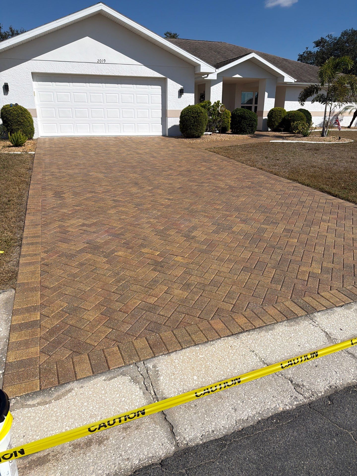Restoring Herringbone Paver Driveway and Walkway in Sun City Center by Supreme Paver Experts