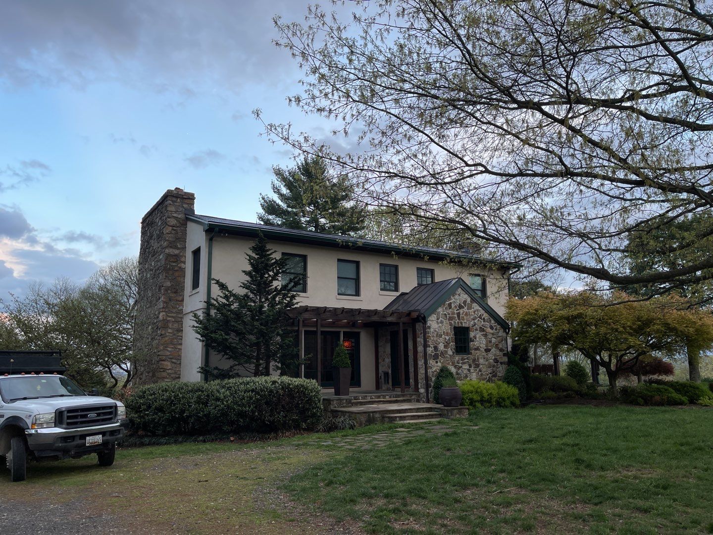 Tesla Solar Roof Replacement by American Home Contractors