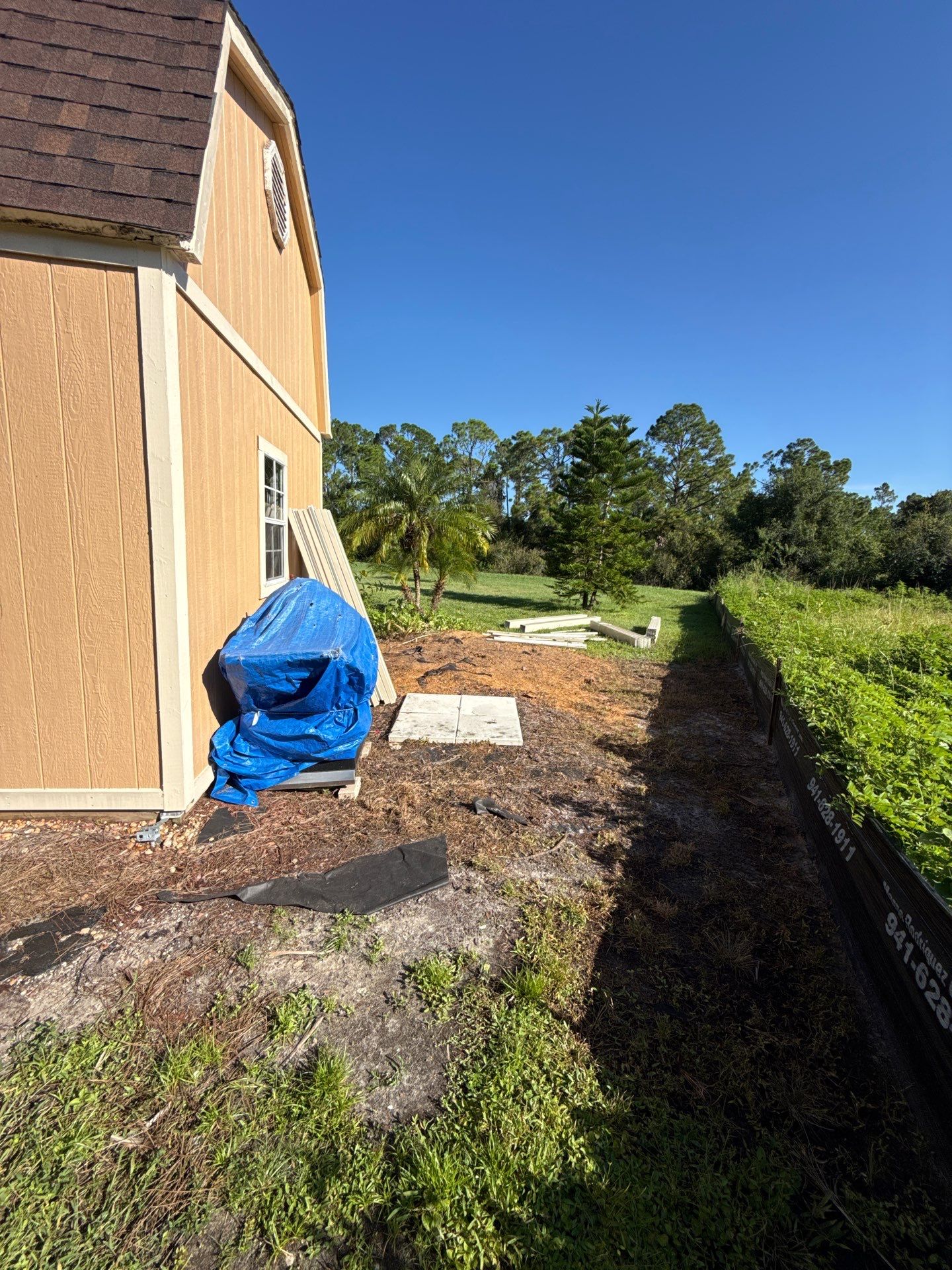 Tan Vinyl Privacy Fence Enclosure Installation in North Port by True Fence LLC