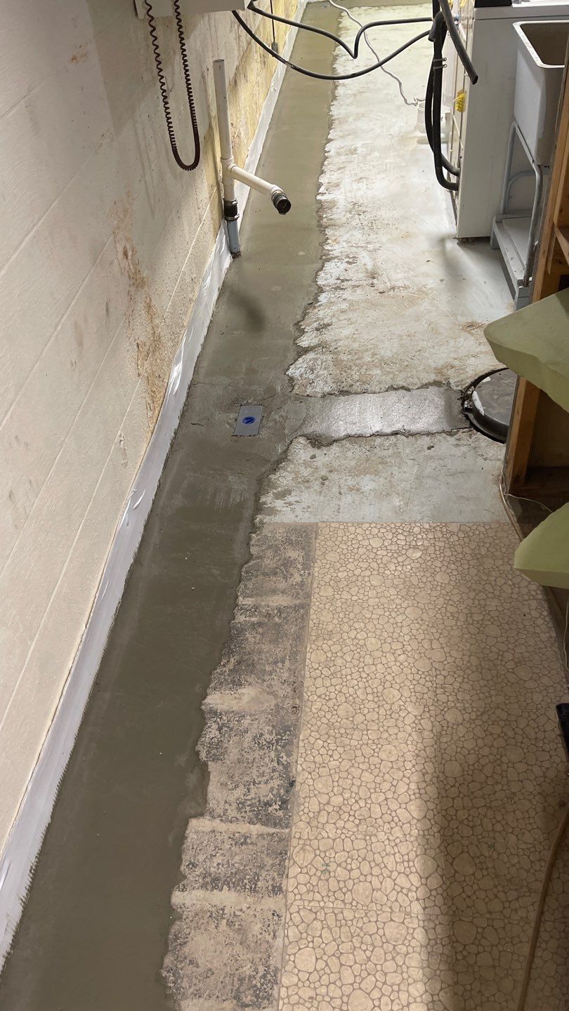 Interior Waterproofing Using GrateDrain™ Products by Toledo Basement Repair 