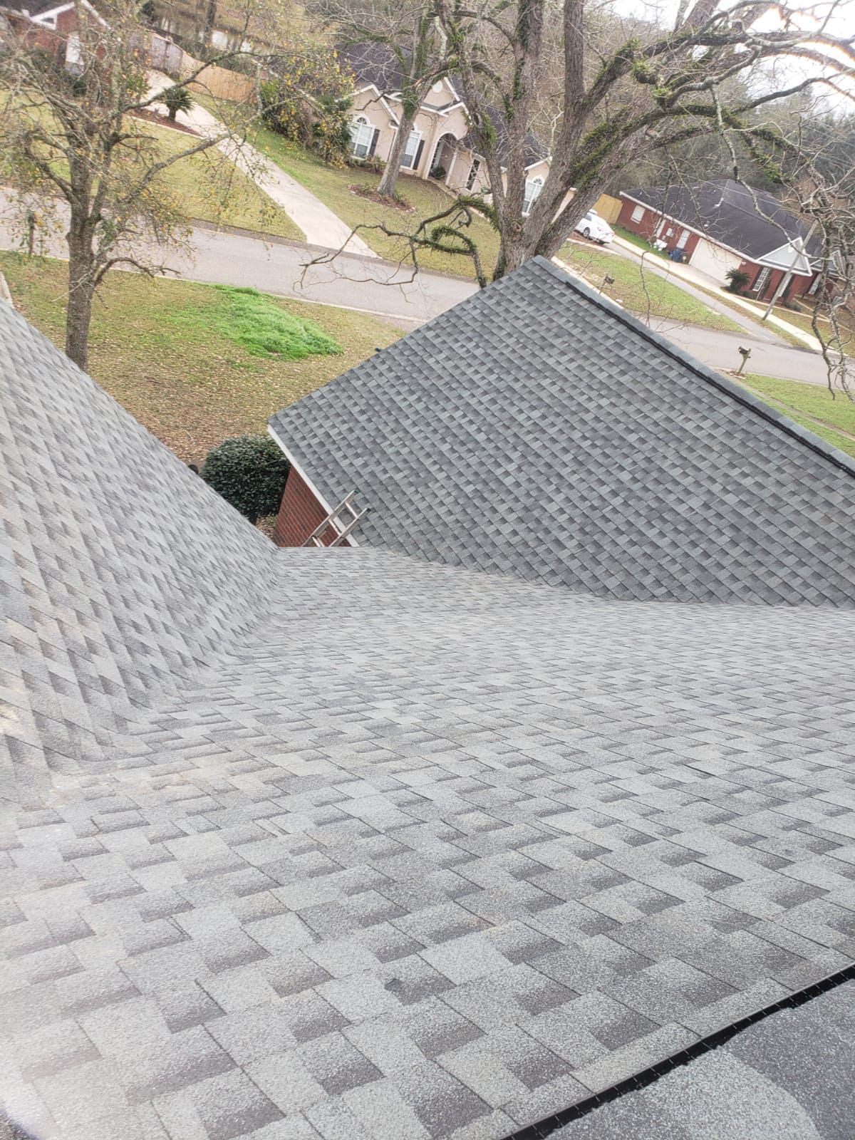 Residential Roofing Installation using Roof Replacement by American Roofing & Construction LLC