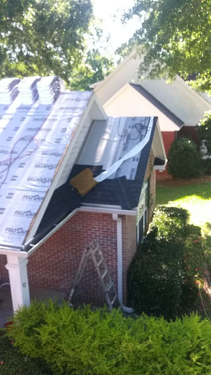 Residential Roofing Installation using Roof Replacement by American Roofing & Construction LLC