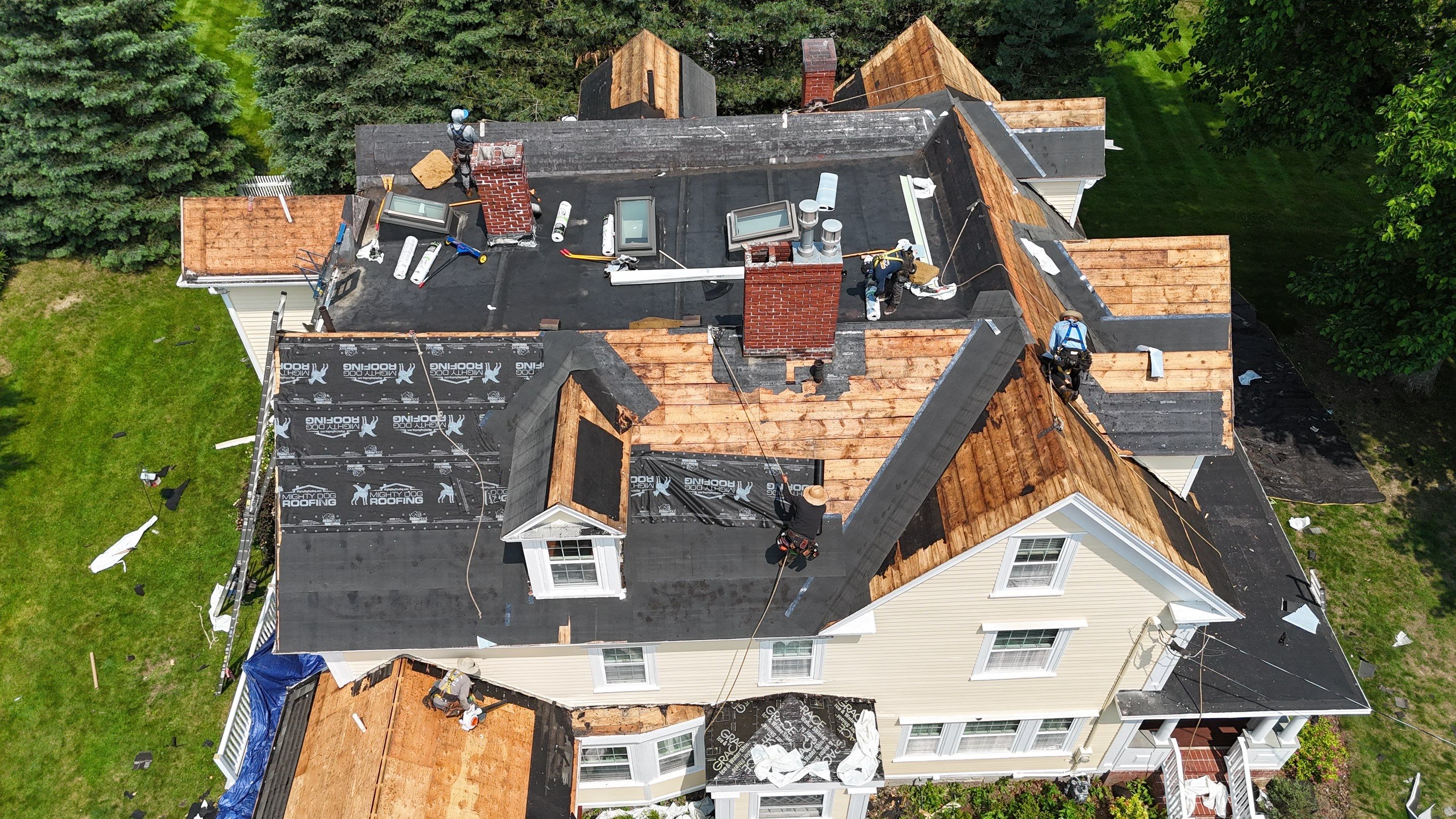 Full Roof Replacement & EPDM Restoration – North Andover, MA by Mighty Dog Roofing of Greater Middlesex County
