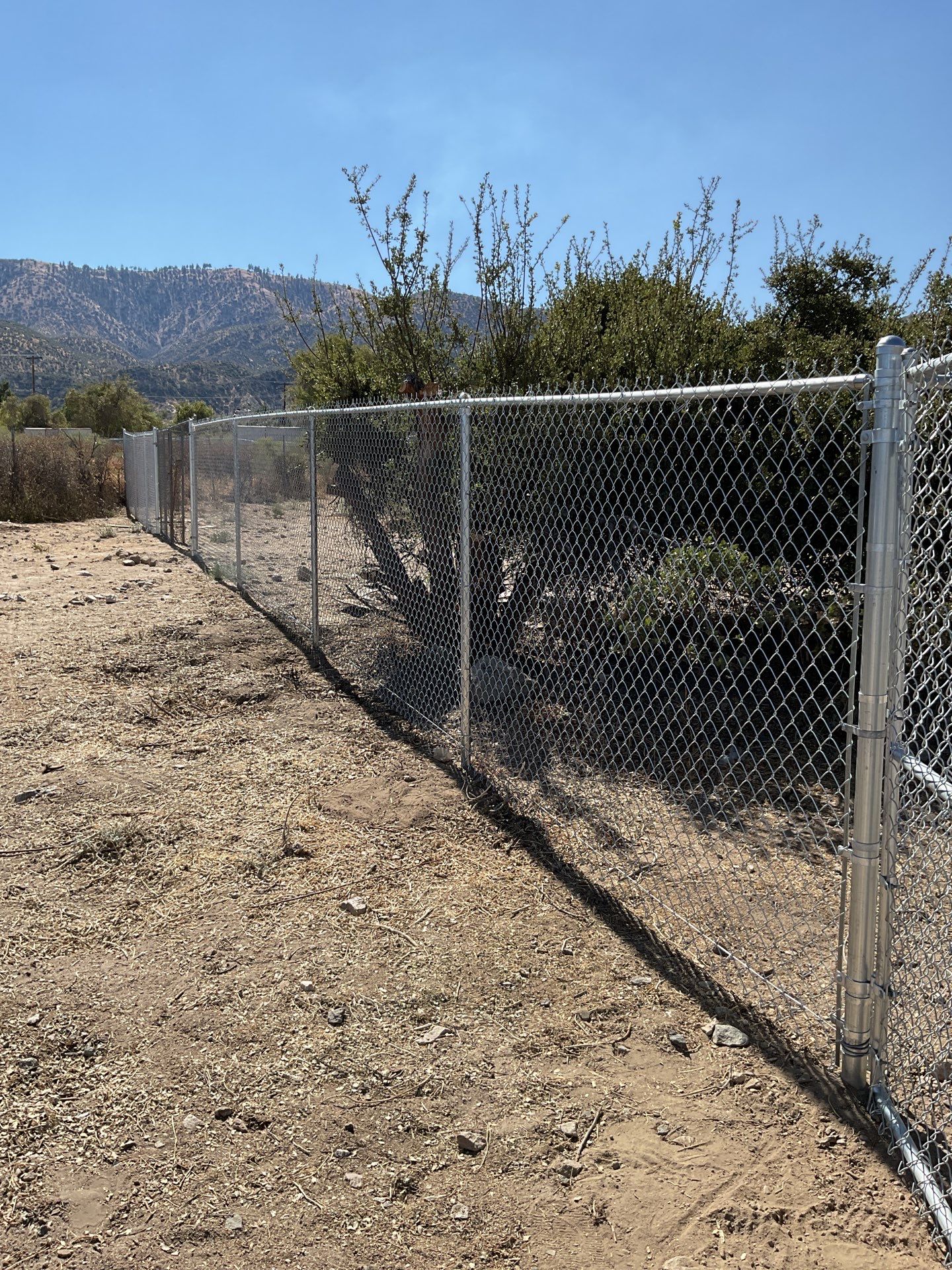 Fence Installation using chain -link by Fence Guys Inc.