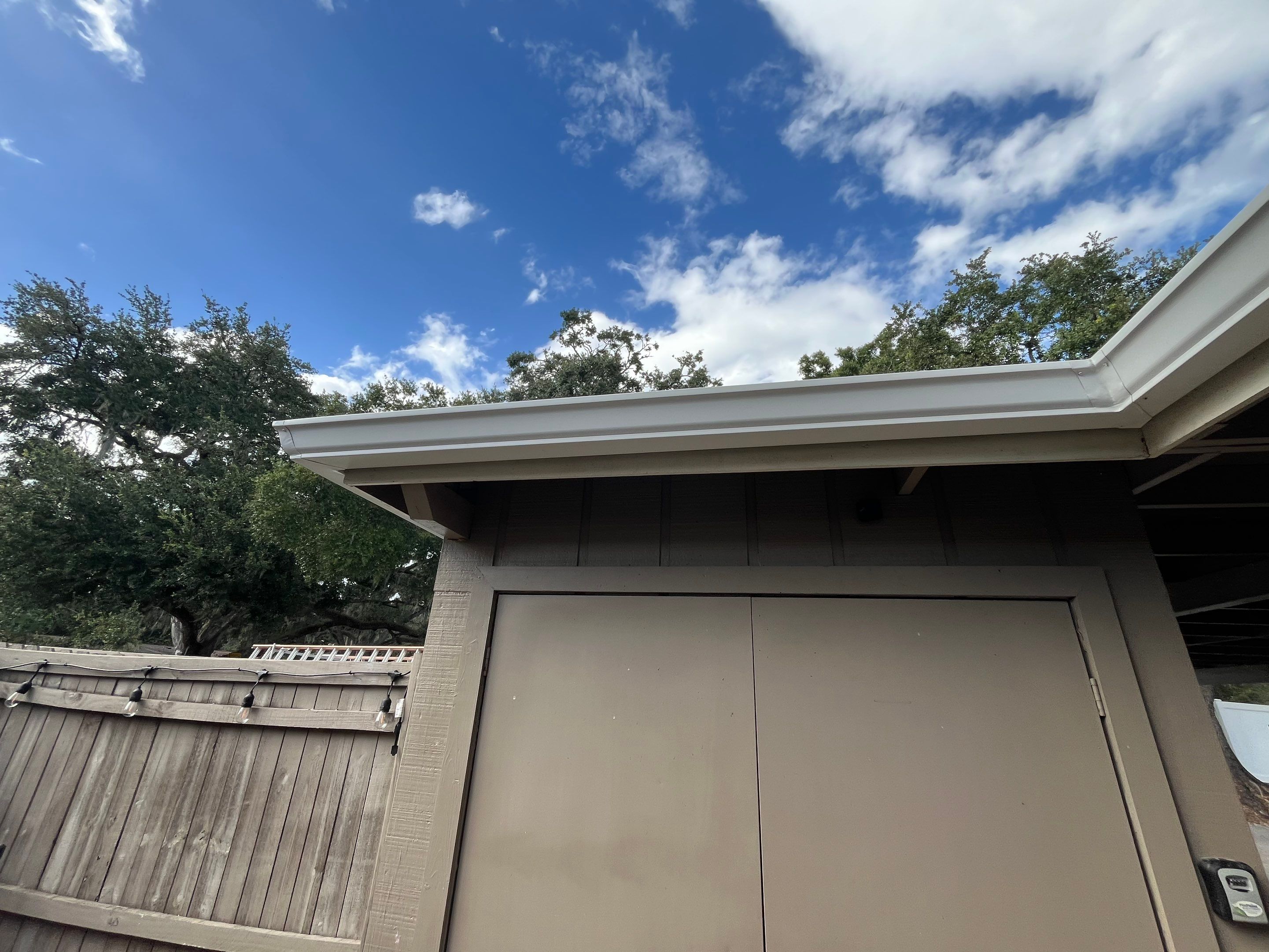 Professional Downspout Installation in Tampa, FL by Gutter Professor by Gutter Professors