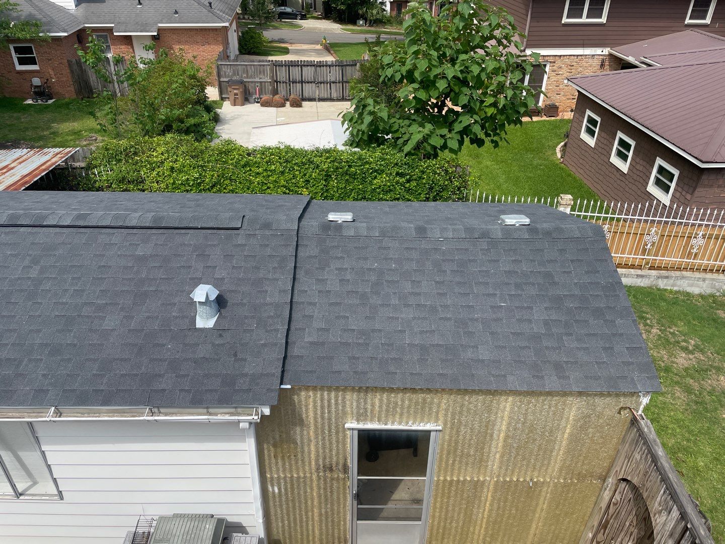 Residential Roofing Installation using Roof Replacement by American Roofing & Construction LLC