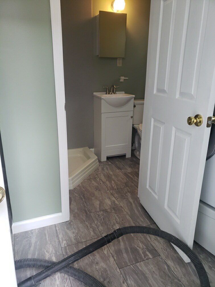 Bathroom Remodel using BCI Acrylic Shower System by Secure Construction Company Inc