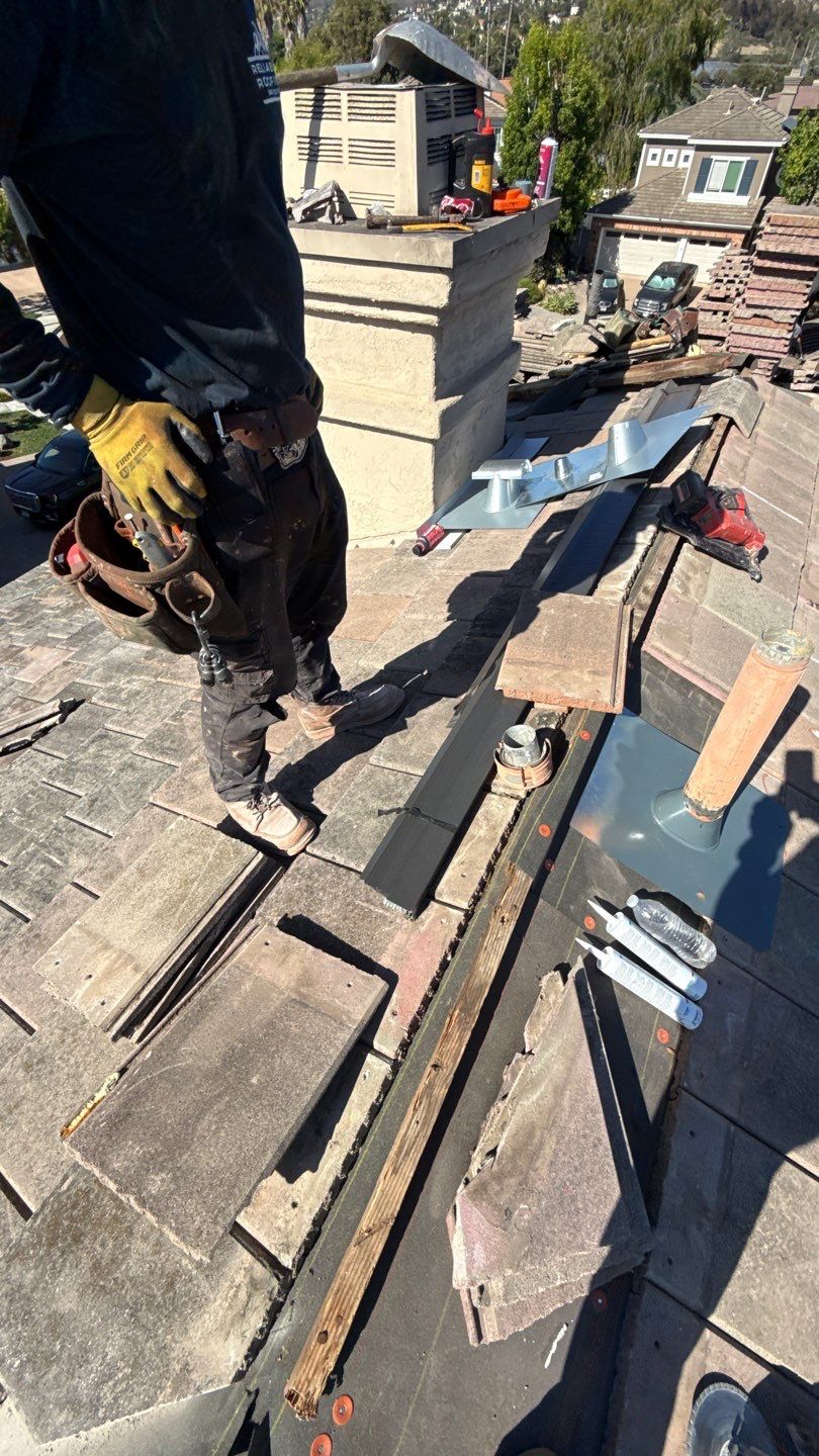 Carlsbad Concrete Tile Roof Replacement with Copper Flashing and Skylights by Reliable Roofing San Diego Inc.