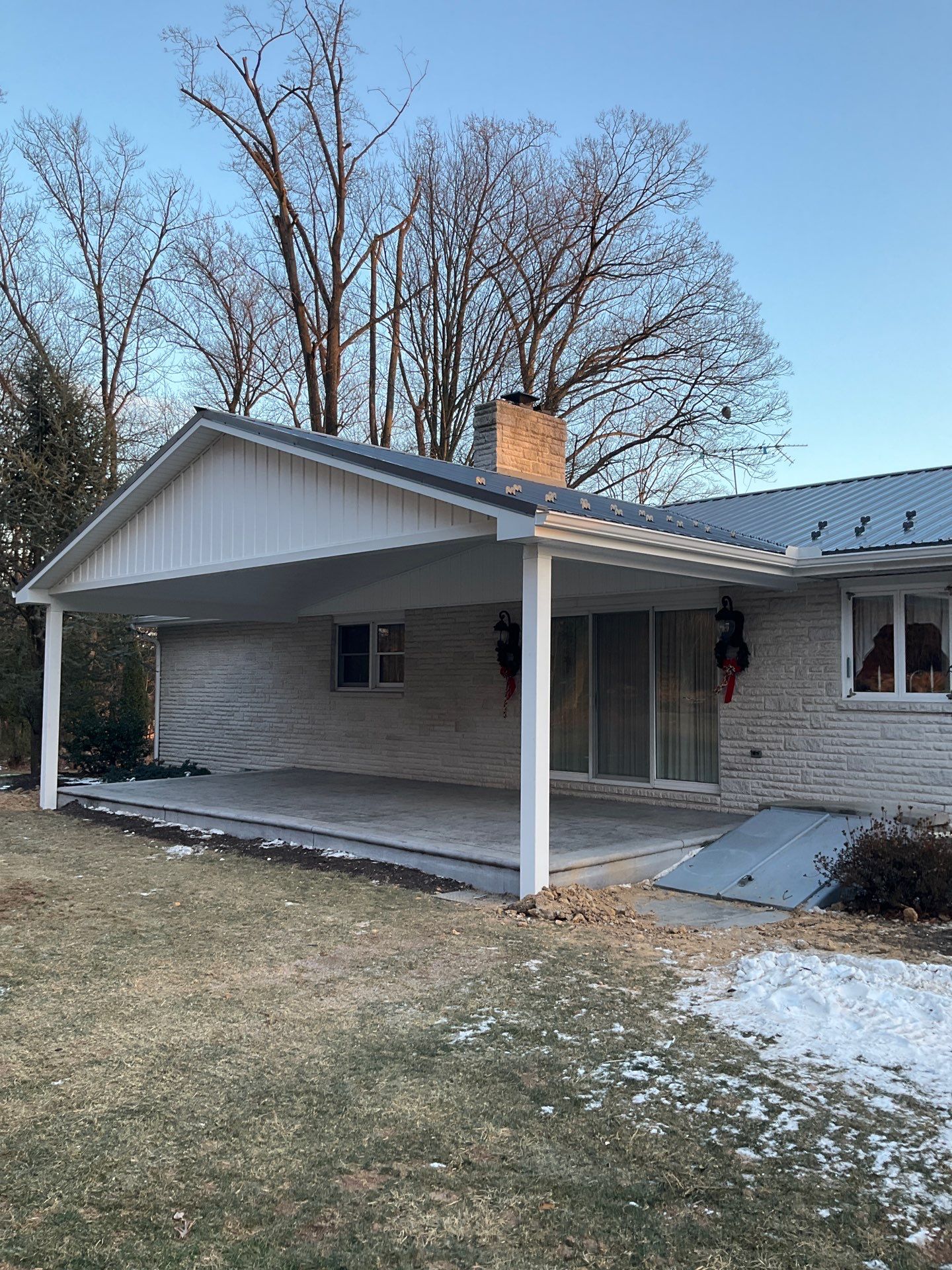 Metal Roof and Gabled Porch Addition in Hegins by Esh Builders