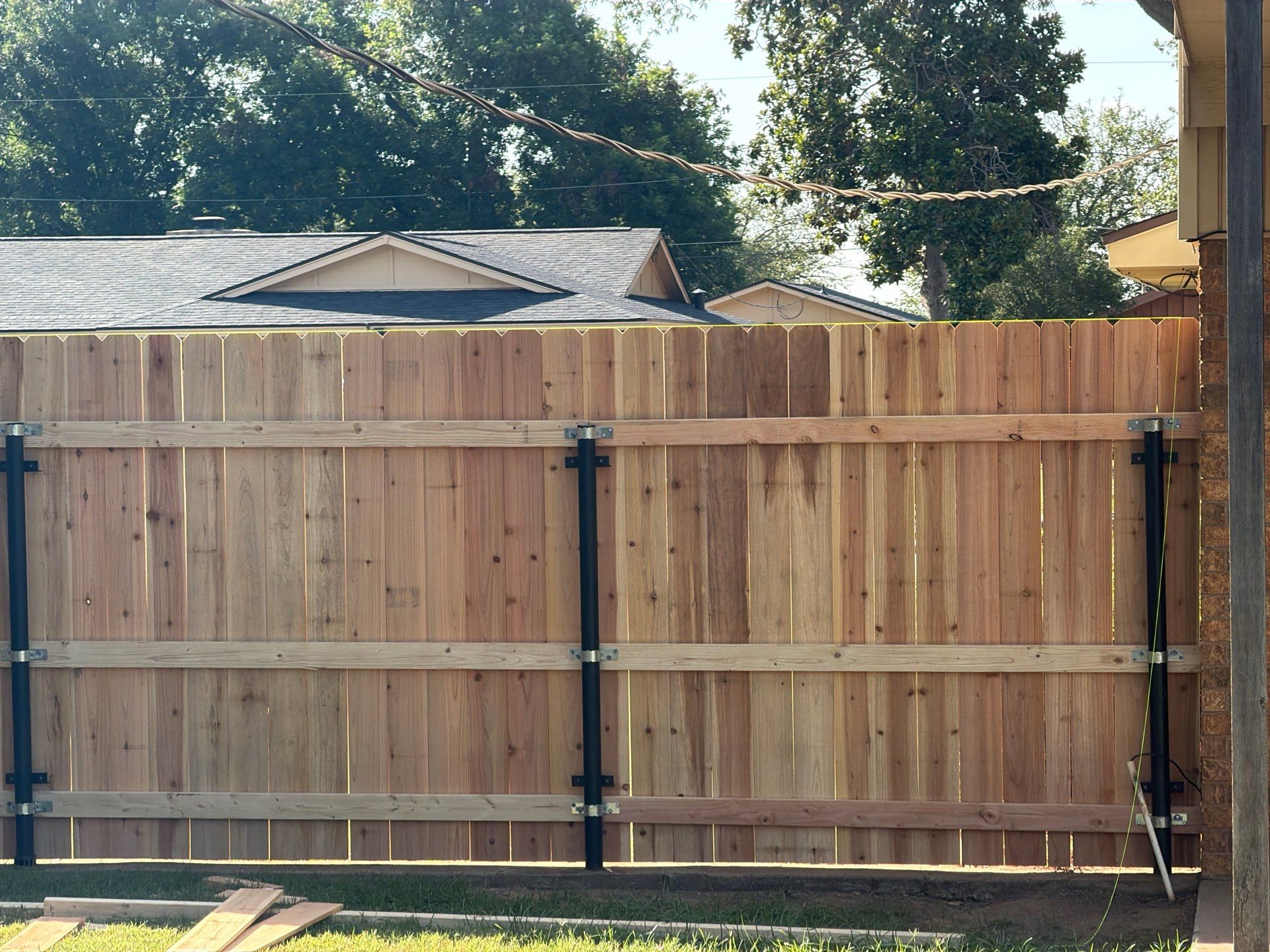 Full Roof Replacement and Privacy Fence Installation in Burkburnett by Shearman Roofing & Construction