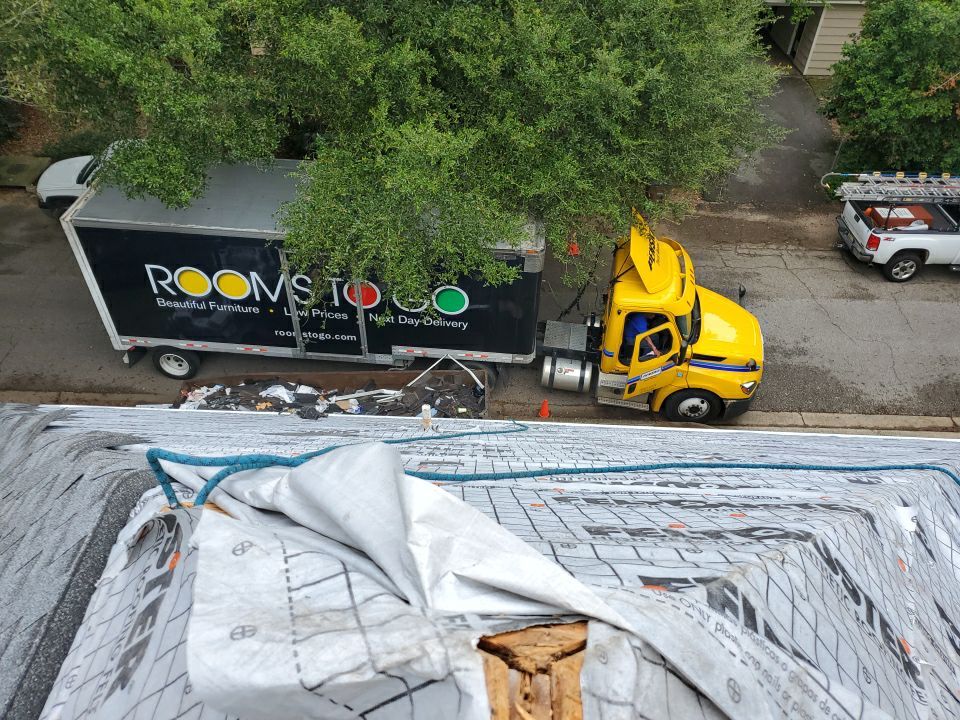 Residential Roofing Installation using Roof Replacement by American Roofing & Construction LLC