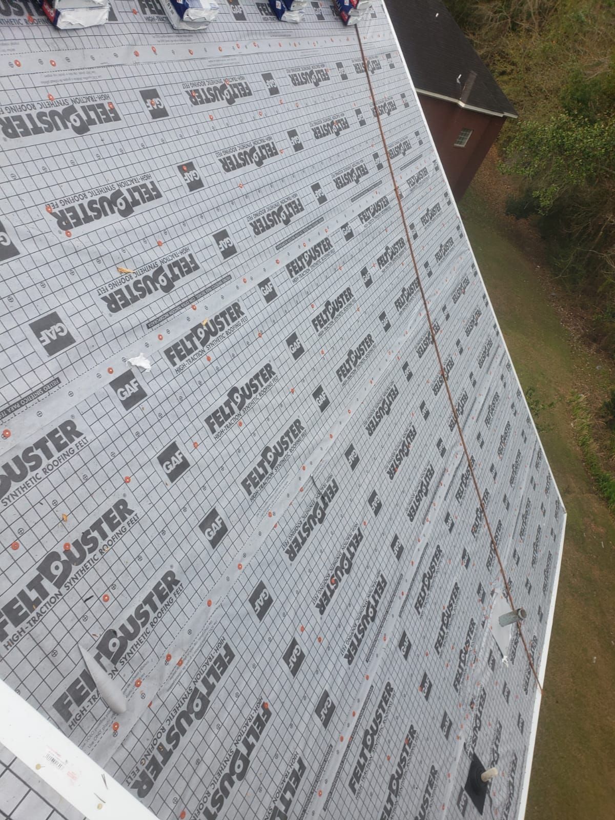 Residential Roofing Installation using Roof Replacement by American Roofing & Construction LLC