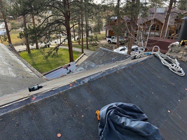 Residential Roofing Installation using Standing Seam Metal by Blue Peaks Roofing LLC 