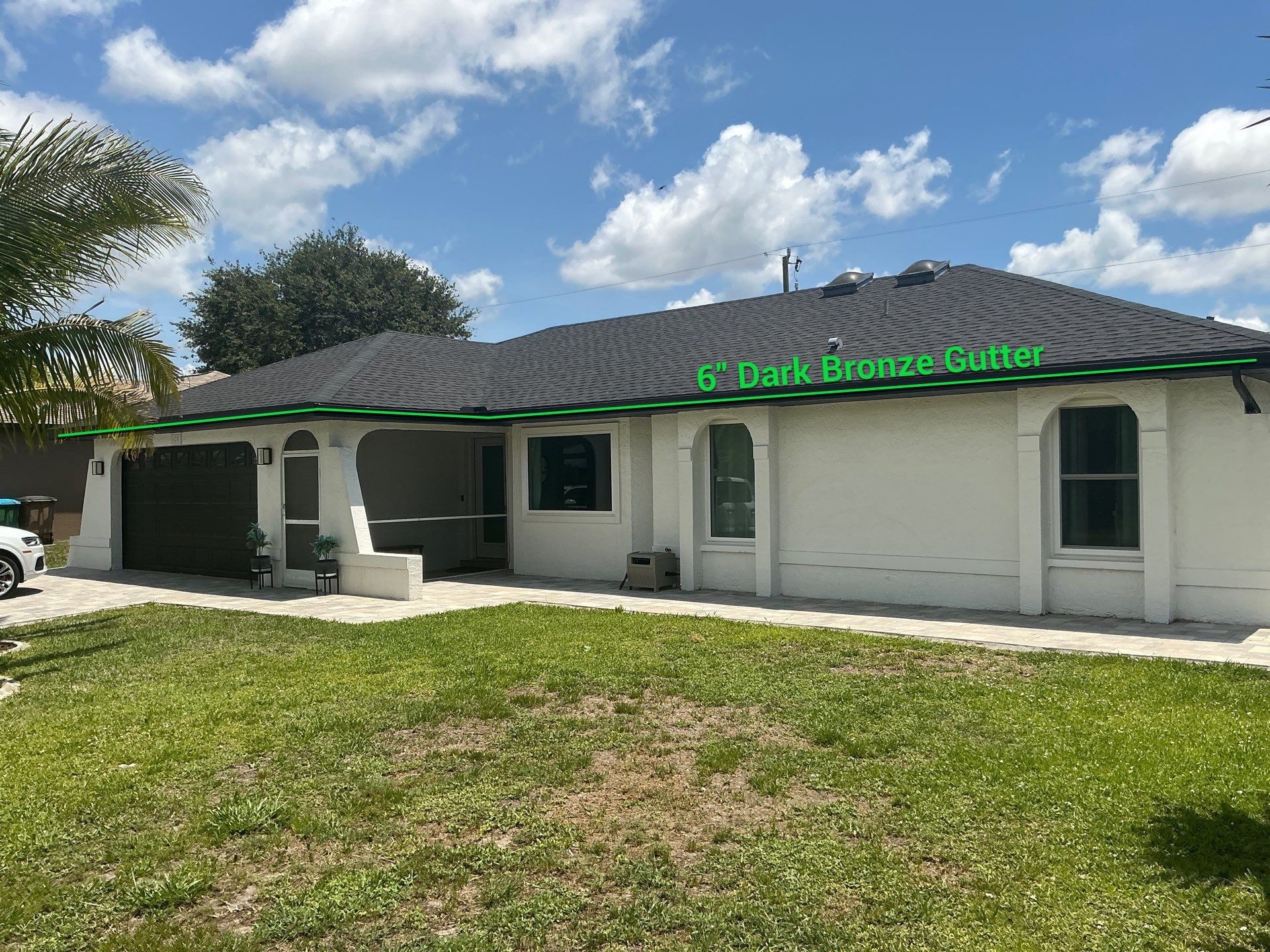 Black Seamless Gutters for a Modern Look in Cape Coral FL by Gutter Professors