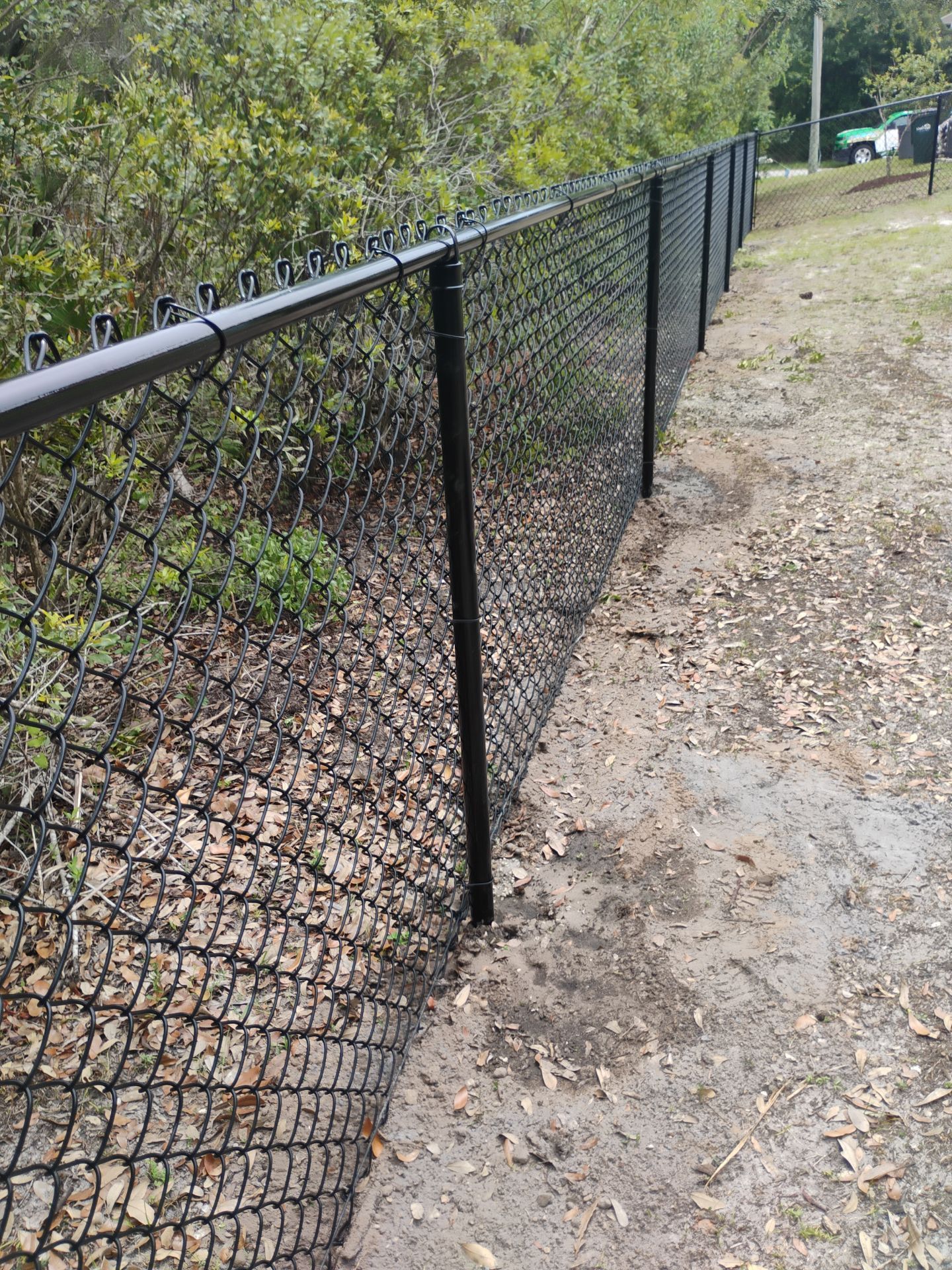 Residential Black Chain-Link Fence Installation in North Port by True Fence LLC