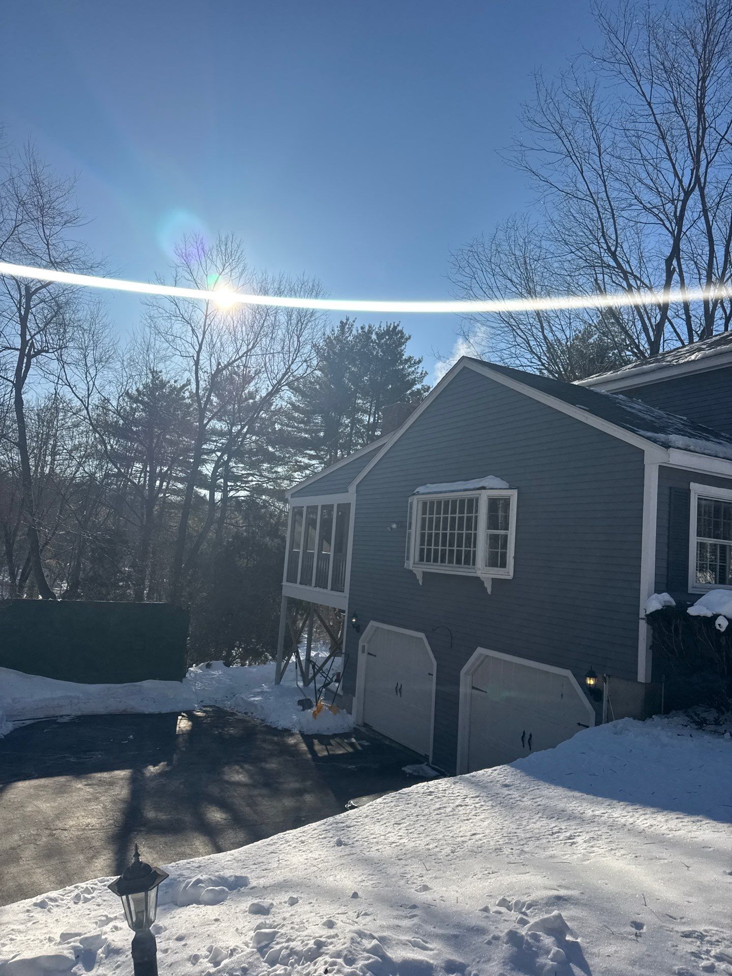 Ice Dam Removal & Snow Removal in Acton, MA by Mighty Dog Roofing of Greater Middlesex County