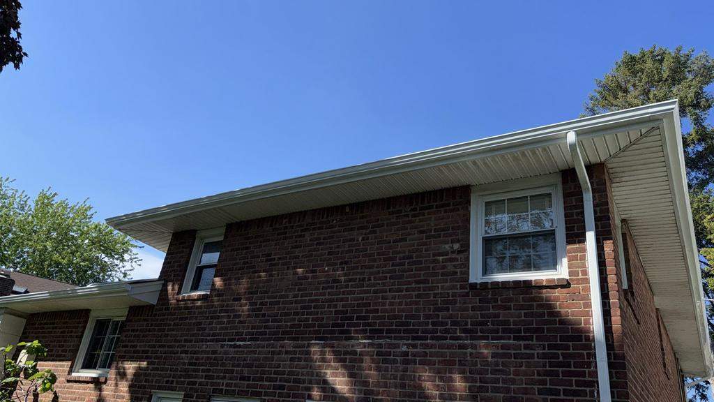 New Gutter & Fascia Wrap by Island Roofing Inc.