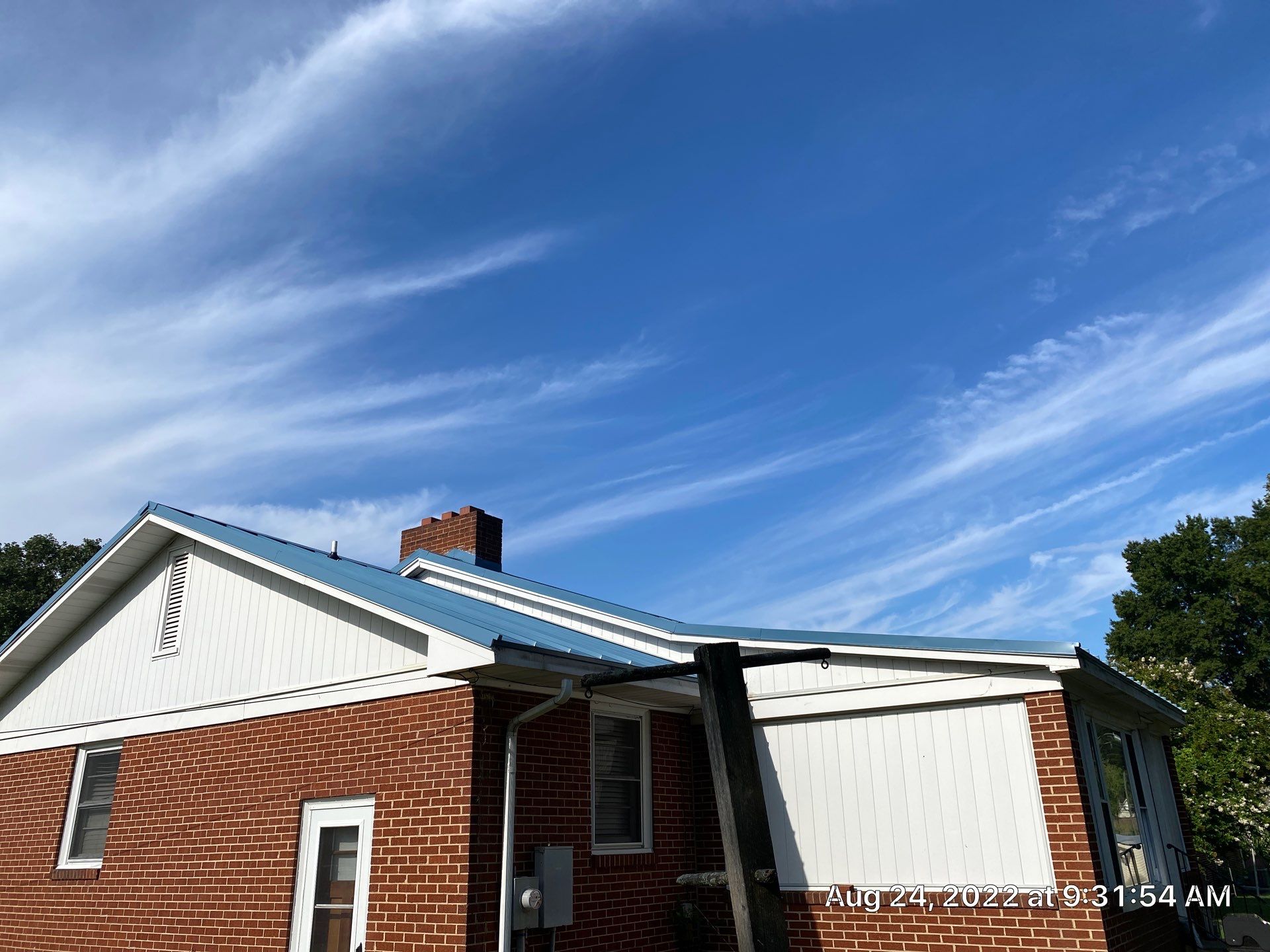 Carolina Blue Standing Seam Roof by Just In Time Roofing and Restoration