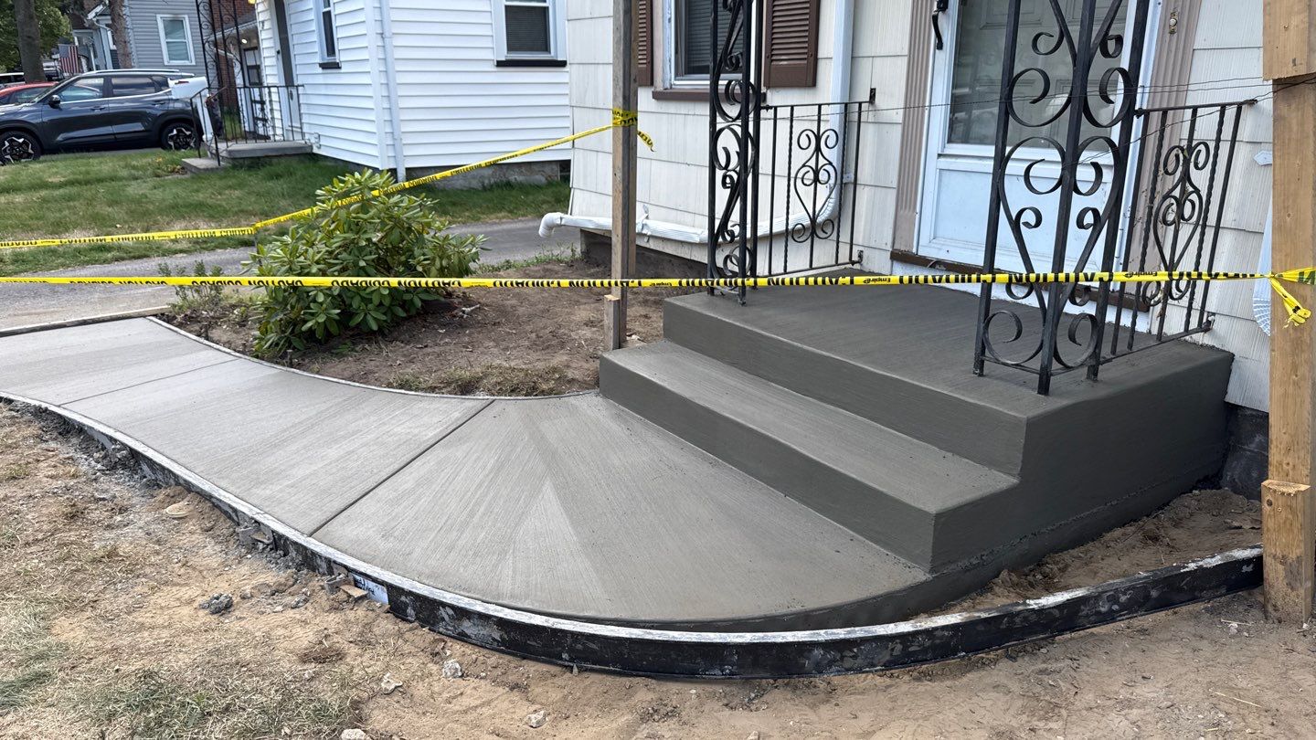 Broom Finish Porch and Walkway  by NG Masonry & Construction LLC
