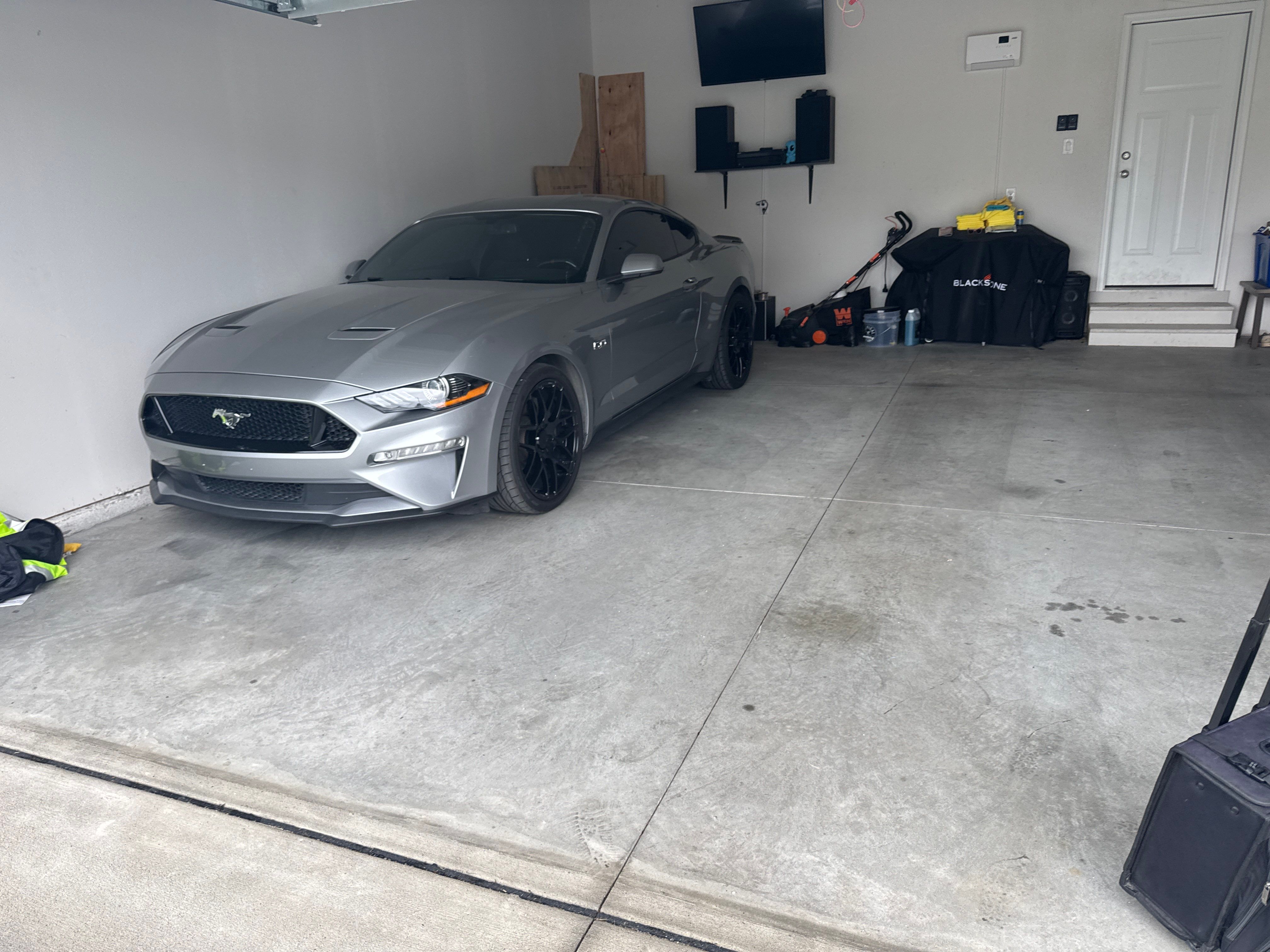 Custom Flake Garage Floor Coating Installation in Altoona by Revival Concrete Coatings