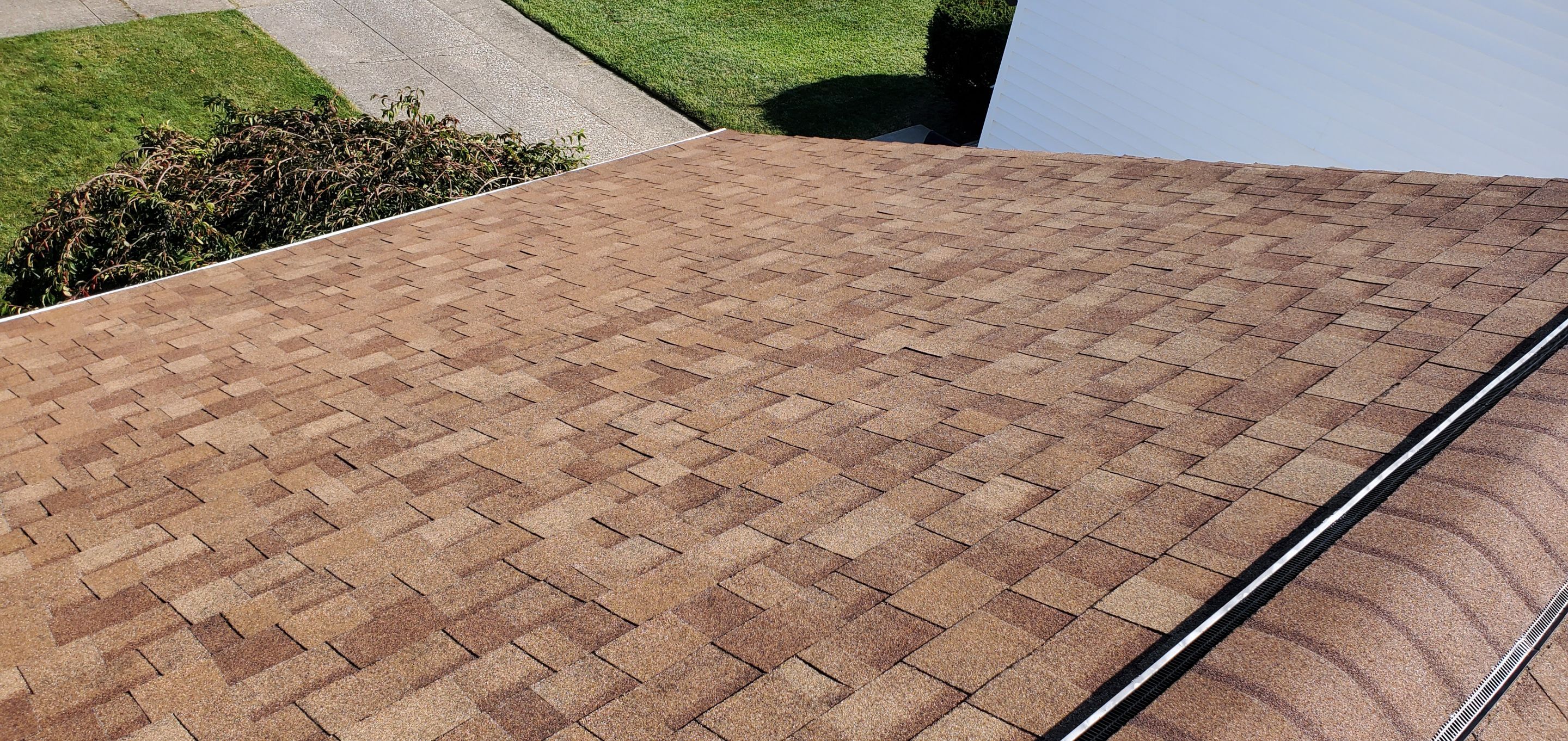 Residential Roofing Installation by Absolute Roofing and Construction