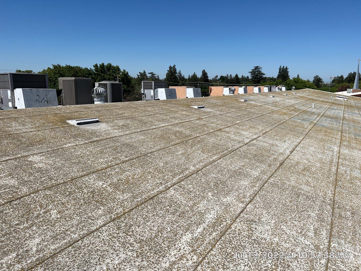 MR Roofing system using Benchmark/PUMA XL coatings over TPO single-ply roofing by Straight Edge Roofing Inc