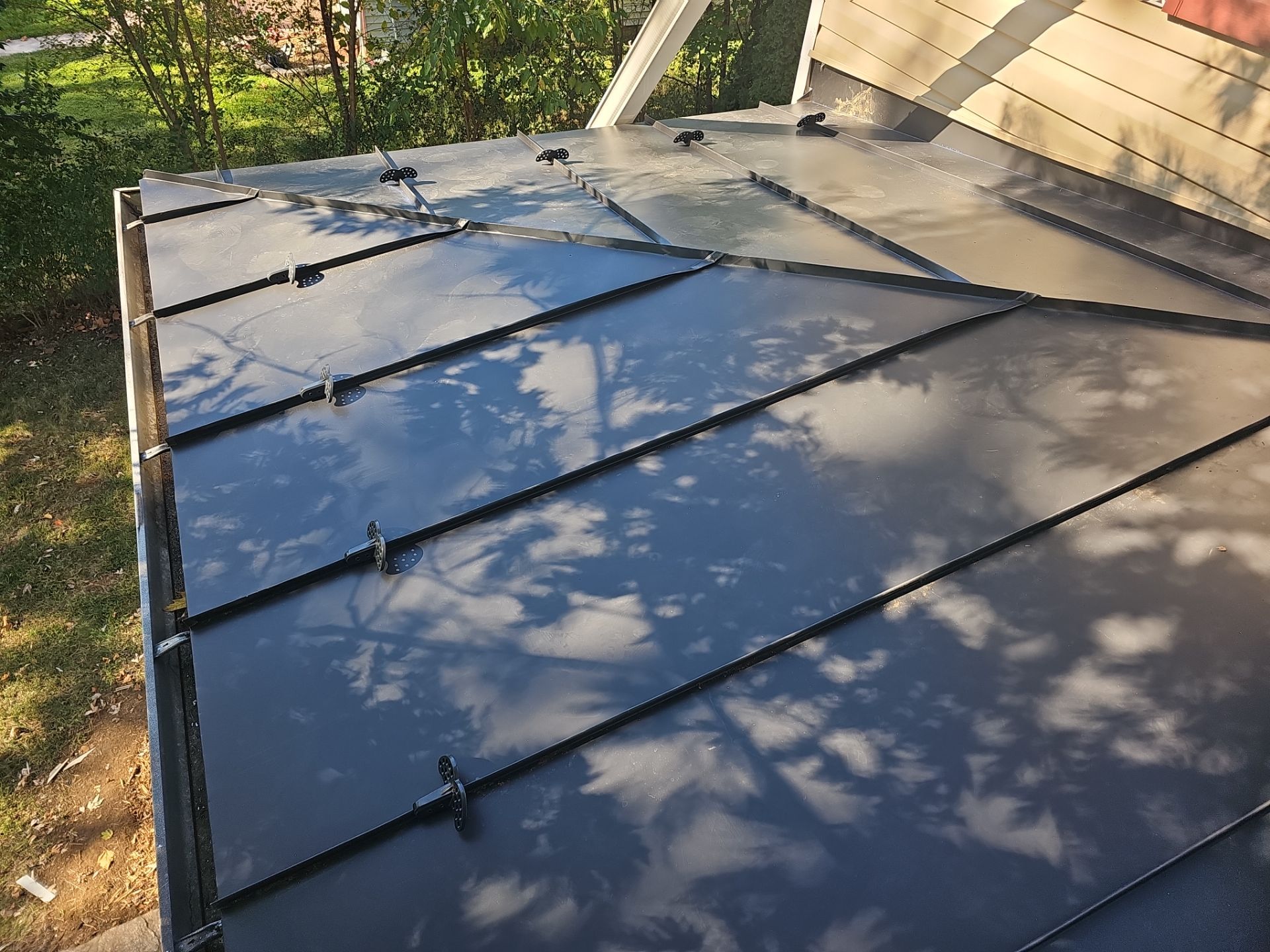 Metal Roof and Gutter Replacement by Winchester Roofing