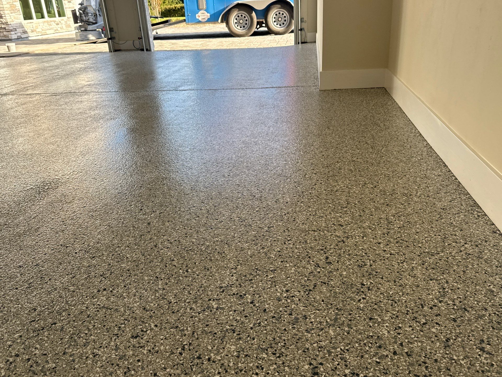 Garage in Tidal Wave by Cross Creek Concrete Coatings