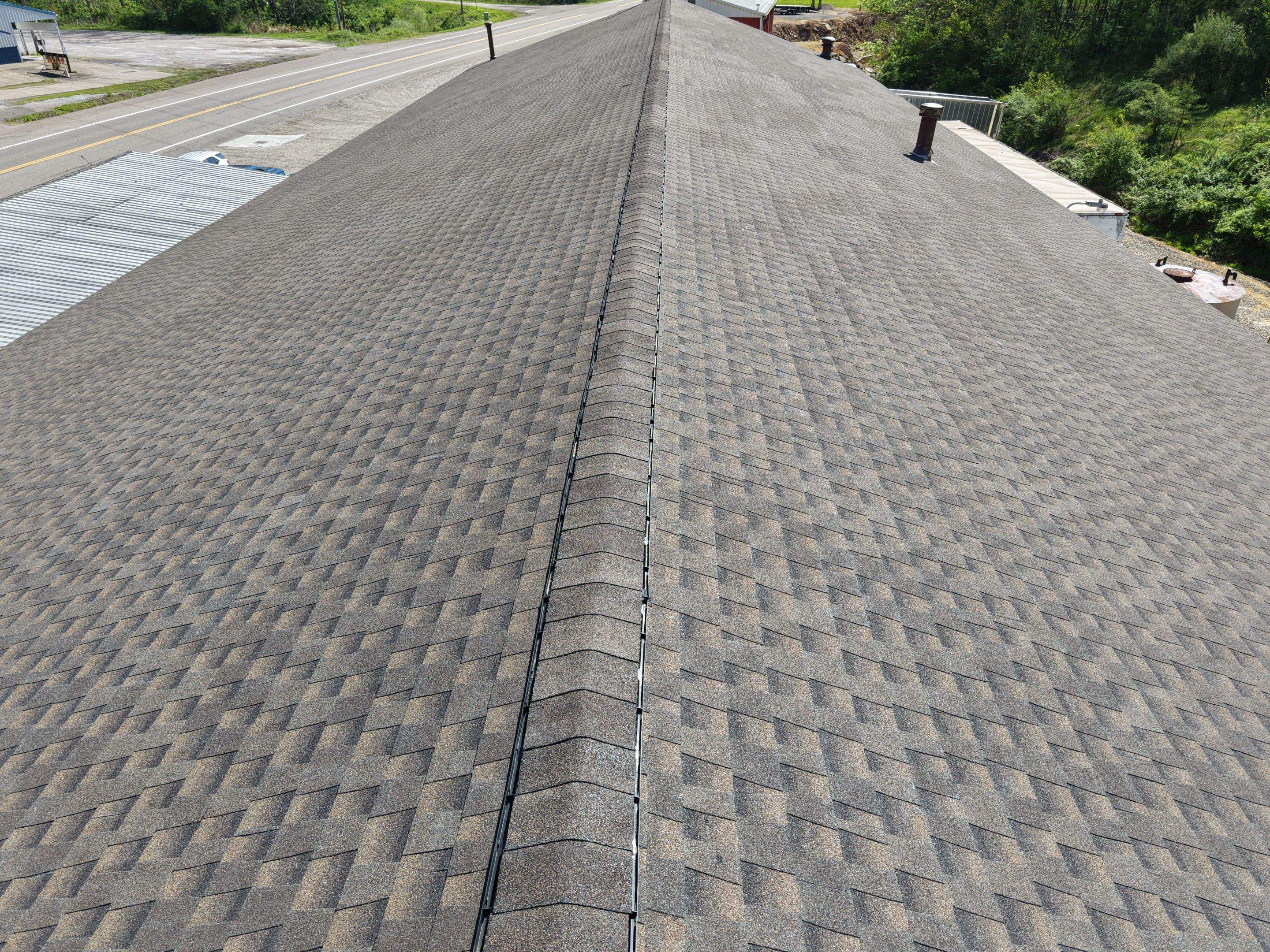 Commercial Roofing Installation using GAF Timberline HDZ Barkwood by Rainstoppers Roofing
