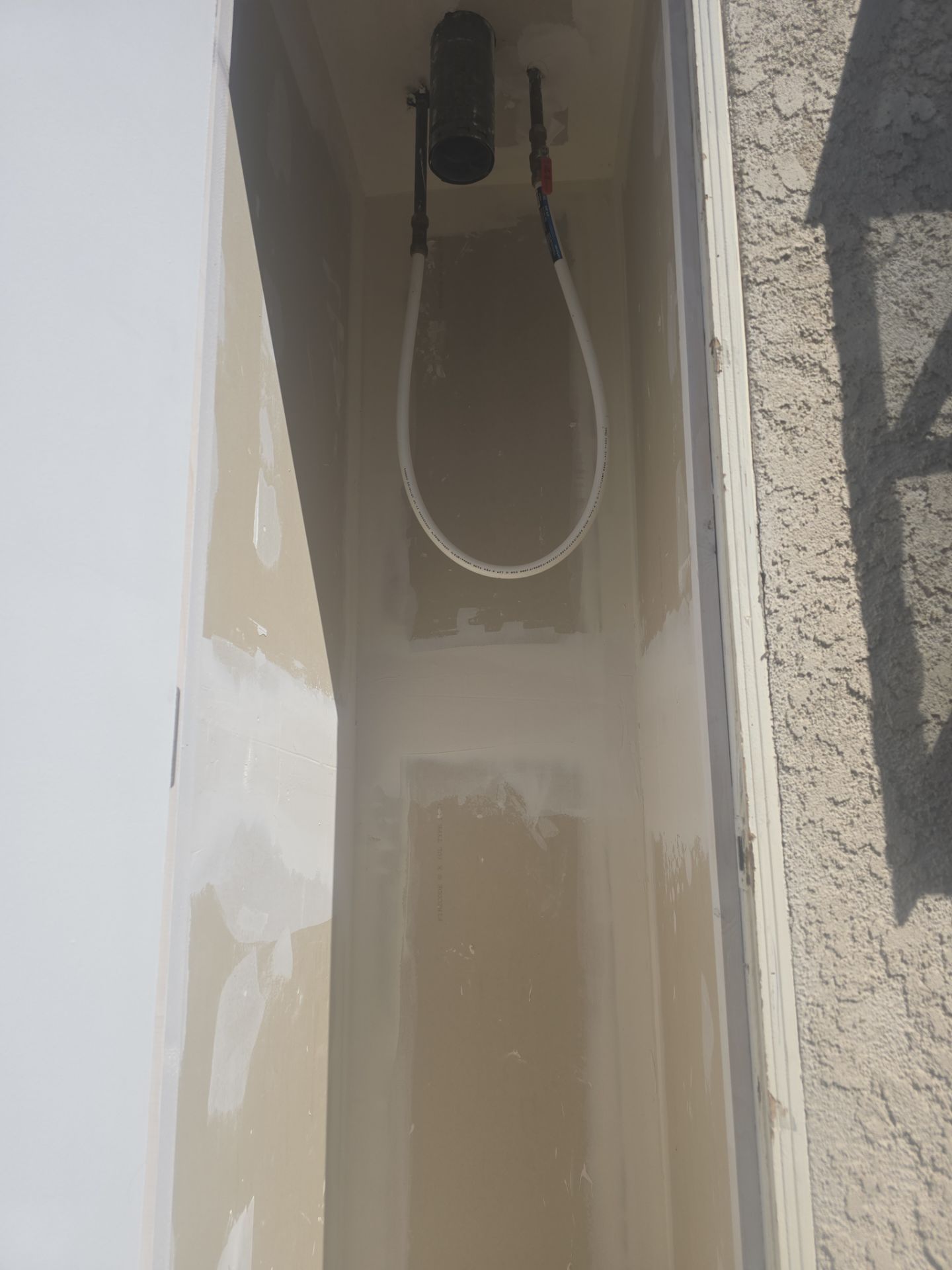 Water Heater Installation and Outside Piping by Us Plumbing