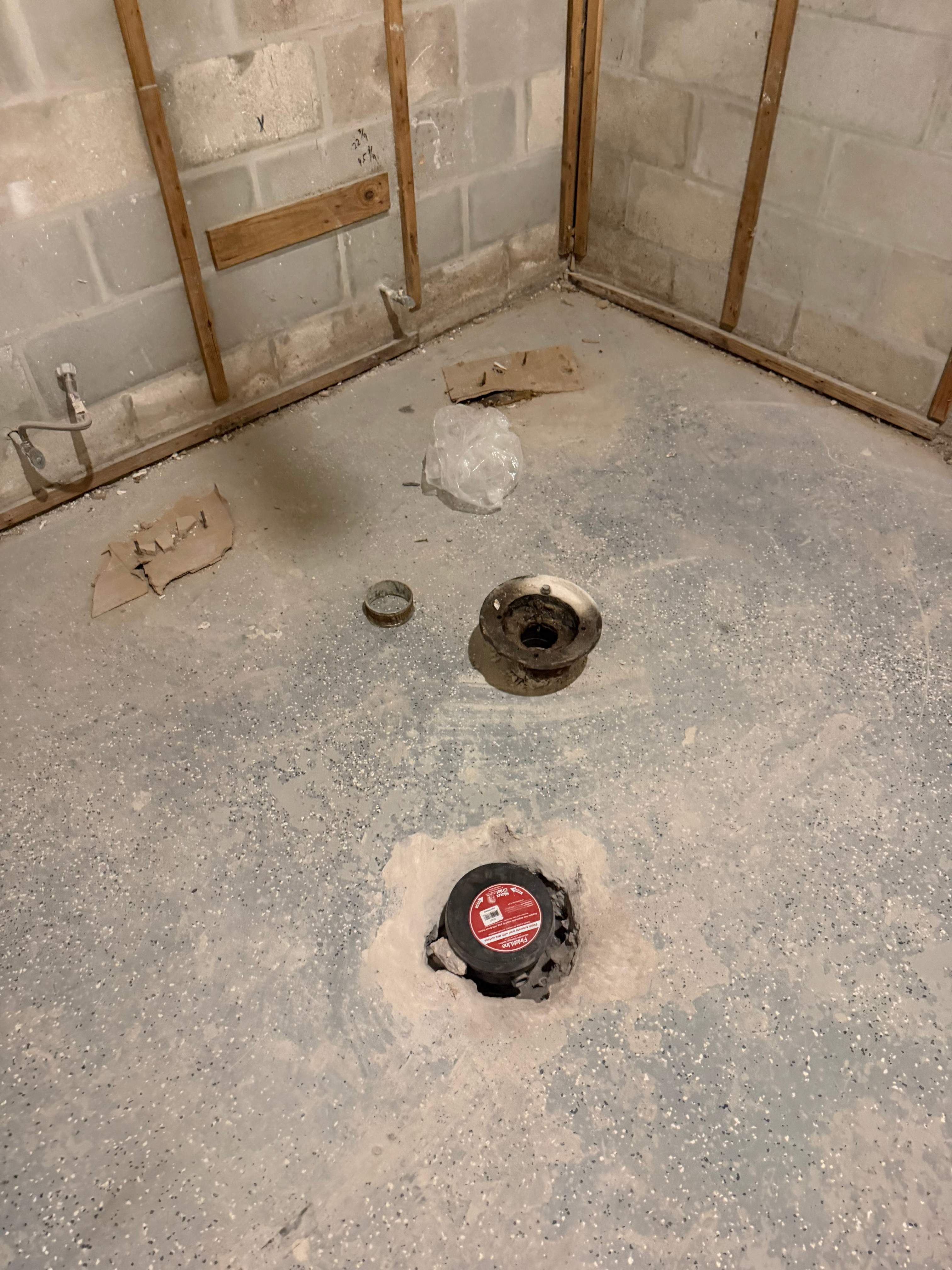 Commercial Restroom Renovation with Epoxy Flooring in Sarasota by Vertical General Contracting 