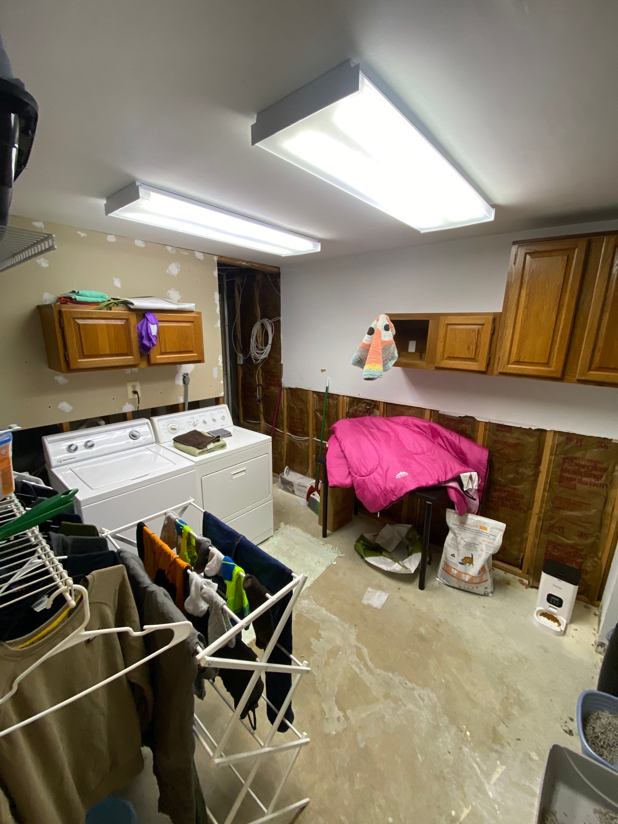 Laundry Room Redmodel using Lifeproof Luxury Vinyl Plank Flooring by The Smet Companies, LLC