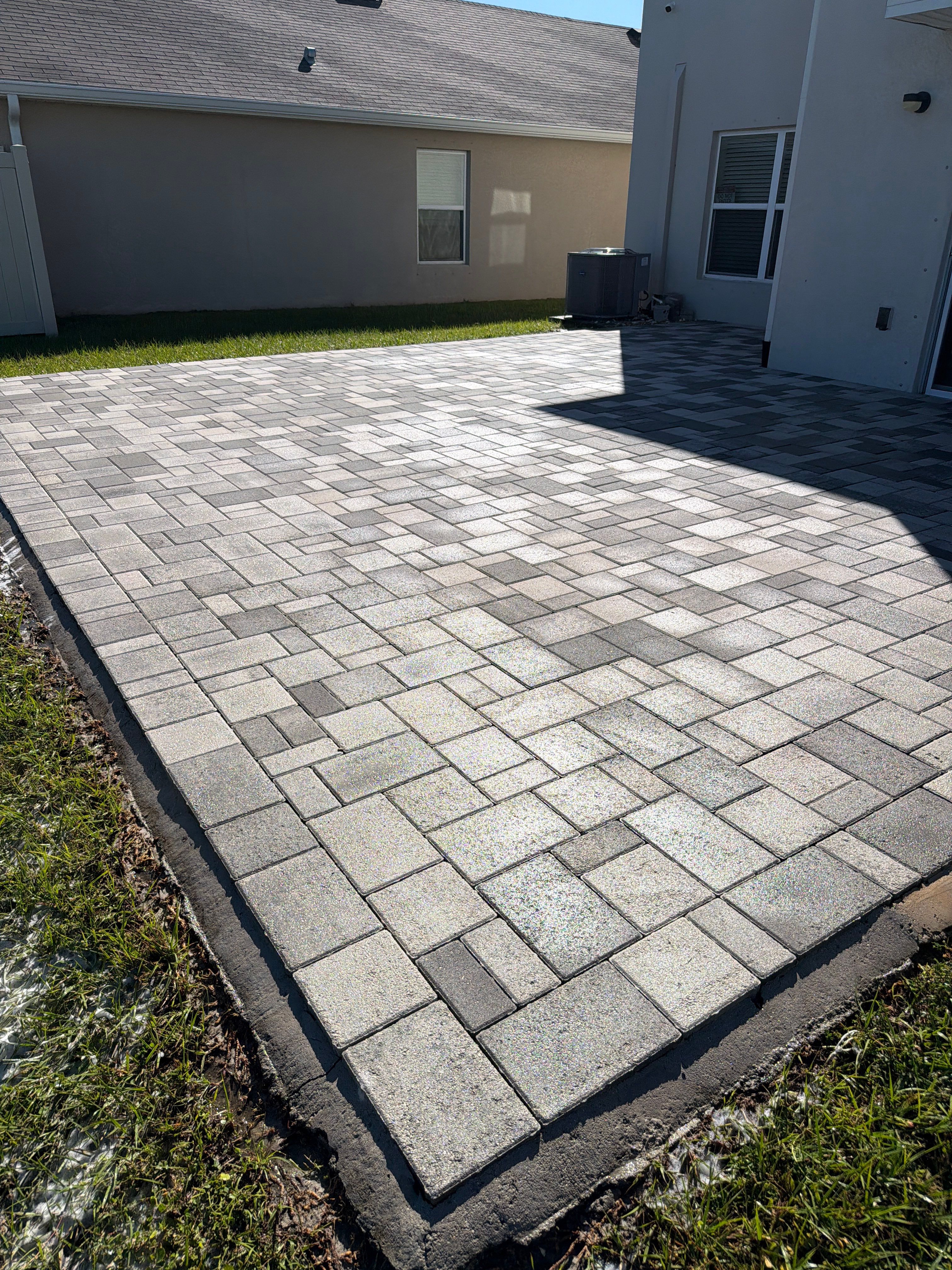 Paver Sealing and Restoration for Large Multi-Toned Patio in Wimauma by Supreme Paver Experts