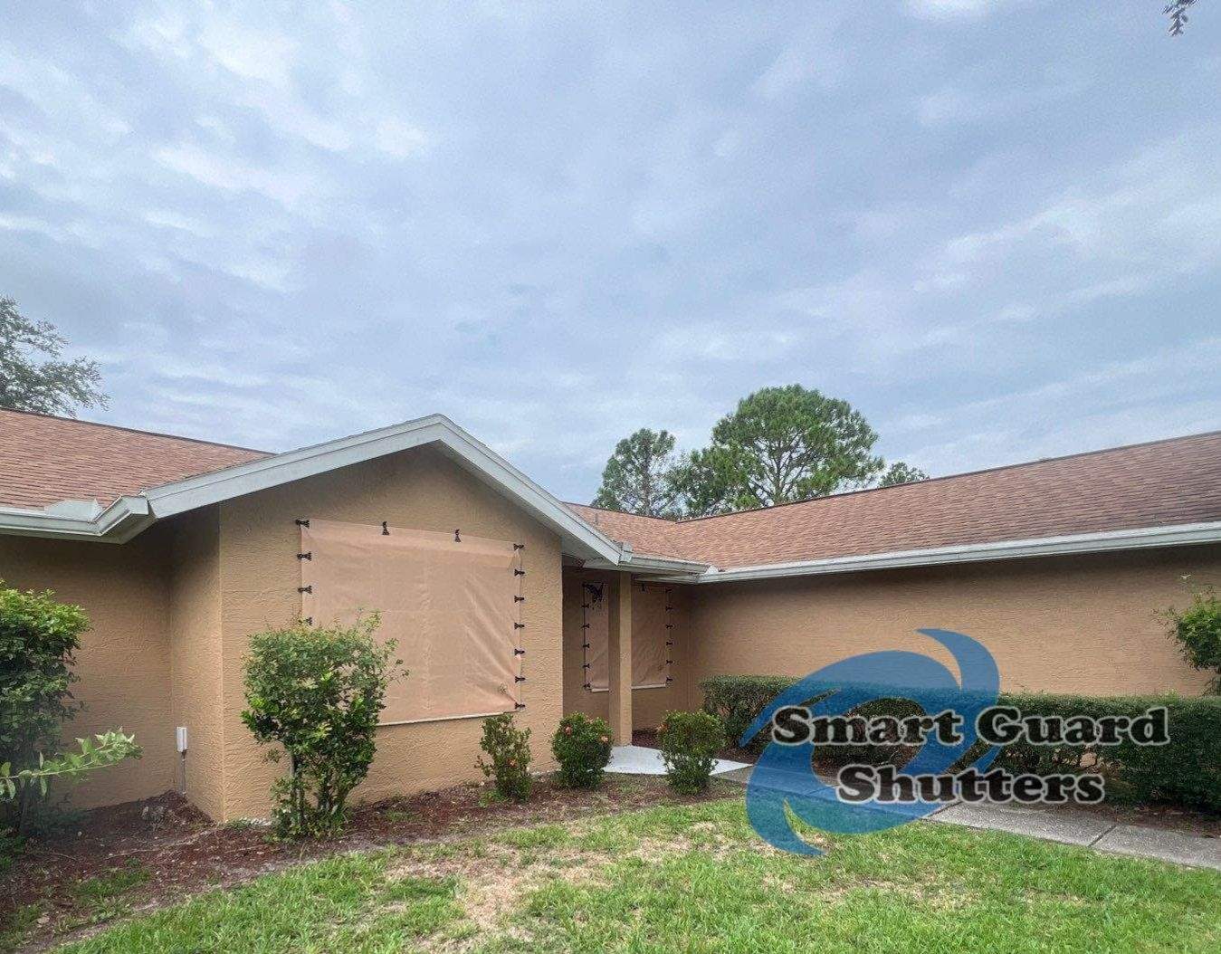 AstroGuard Hurricane Fabric in Tan by Smart Guard Shutters