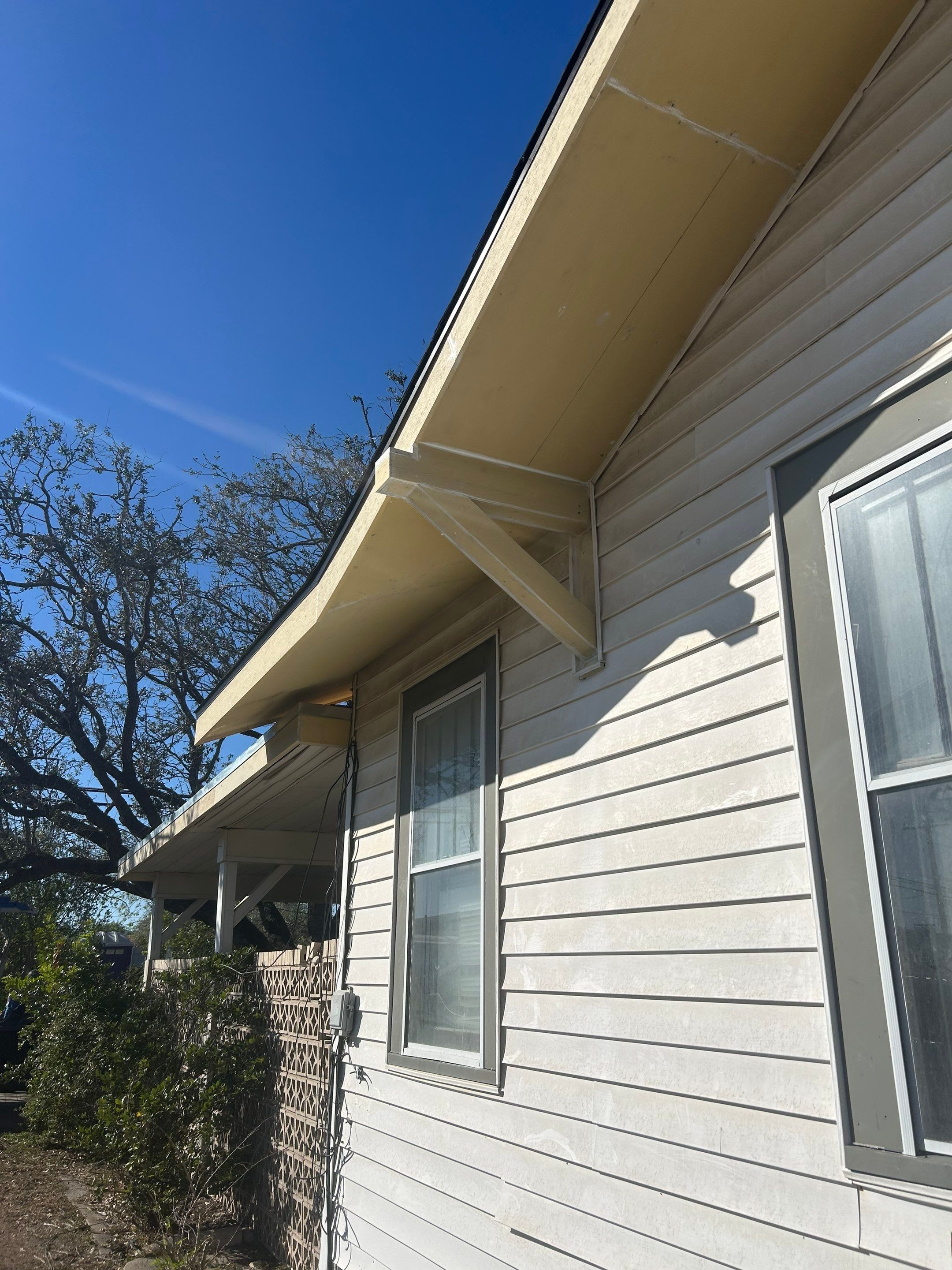 Mid-Century Bungalow by Bayfront Roofing and Construction