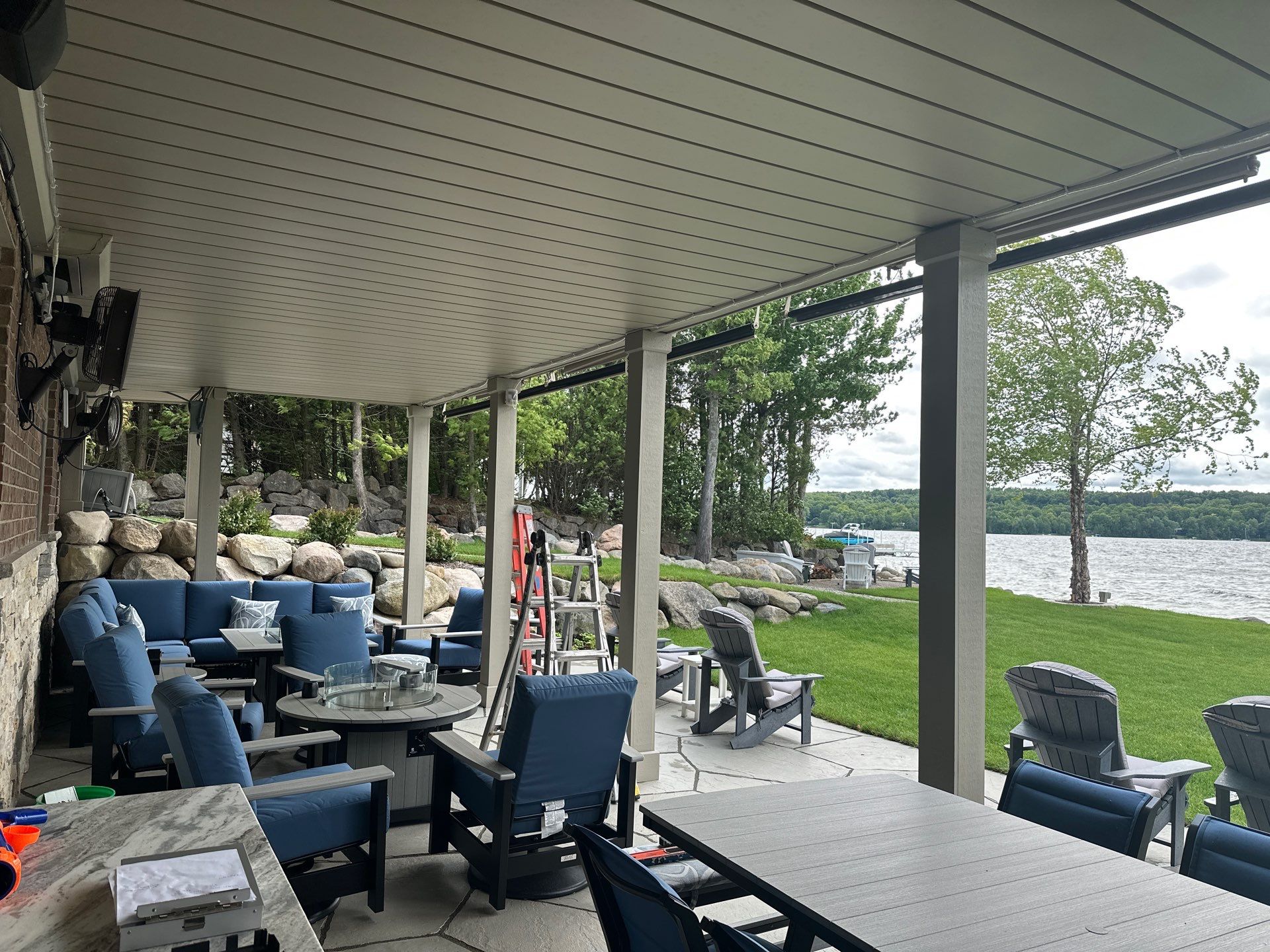 Custom Underdecking System and Outdoor Kitchen in East Jordan by Rainbow Seamless Systems