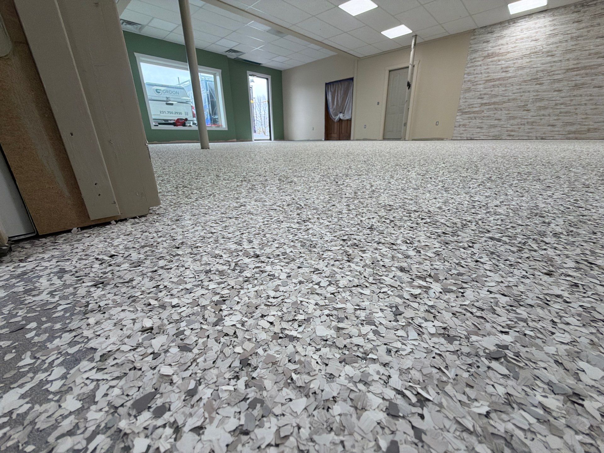 Commercial Epoxy Flake Floor Installation and Concrete Refinishing in Montague by Gordon Painting