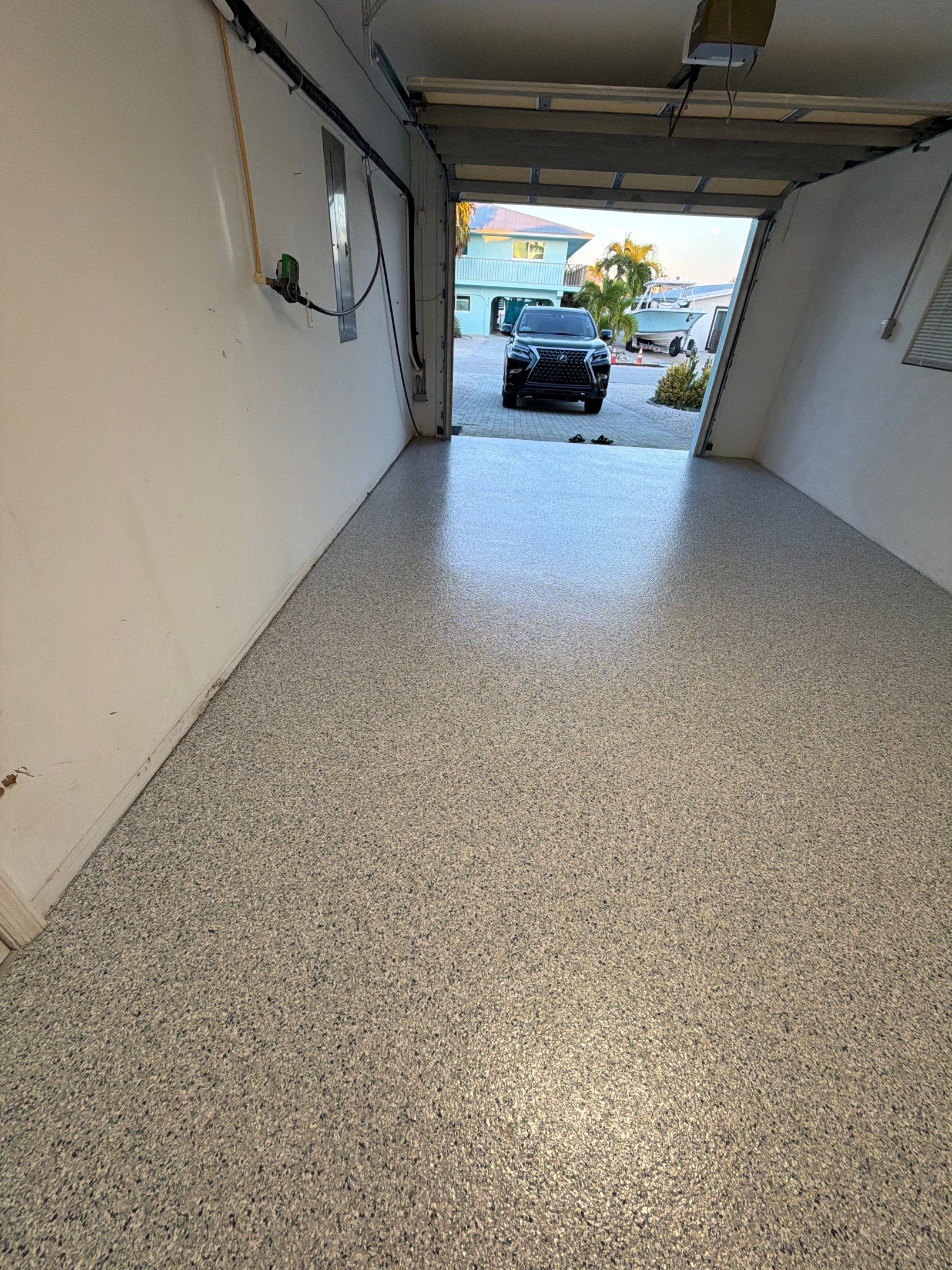 “Tidal Wave” Garage Floor in Key Colony Beach, FL by Tropical Epoxy Coatings & Creations LLC 