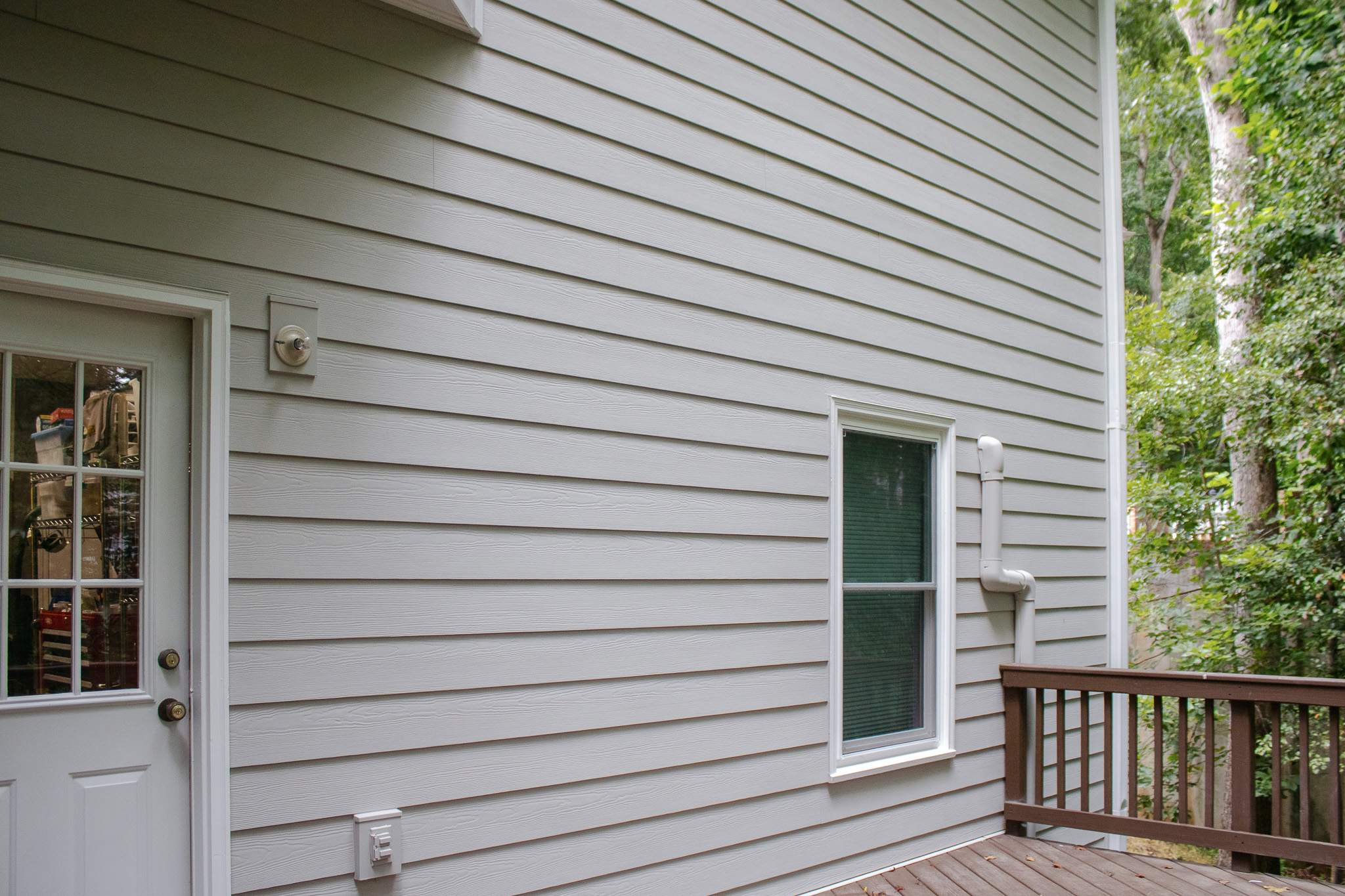 Alpharetta Siding Replacement & Wrought Iron Railing Painting by Nelson Exteriors
