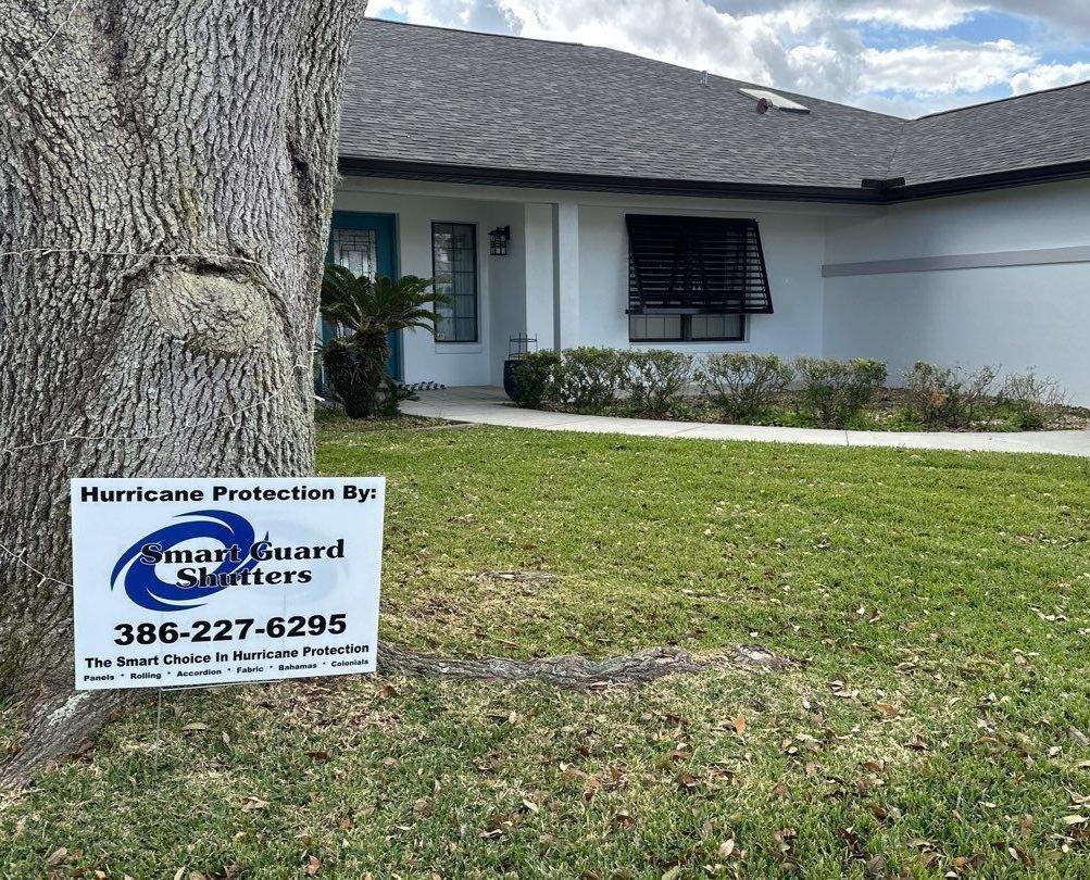 Bahama Shutters in Grey Brown by Smart Guard Shutters