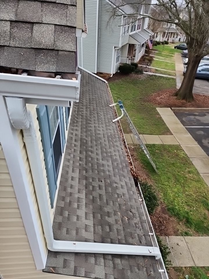 Gutter Cleaning using water by Power Wash Masters LLC