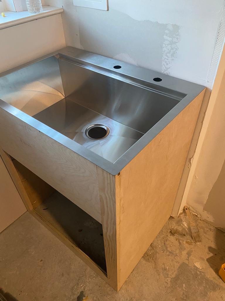 Basement Remodel using Wood by Home Concepts Construction