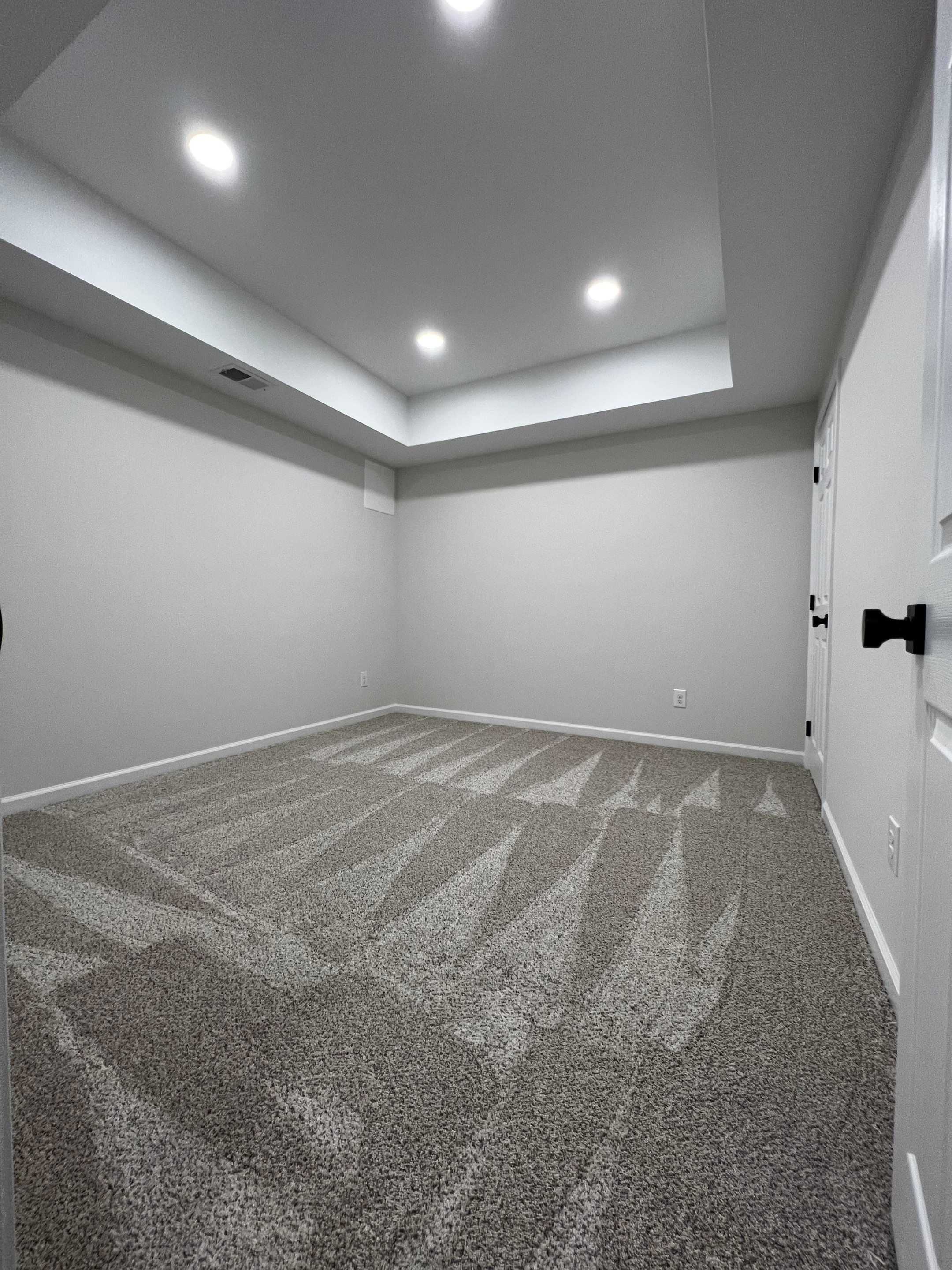 Finished Basement with Custom Built-ins and Full Bathroom in Acworth by Swift Home Renovations