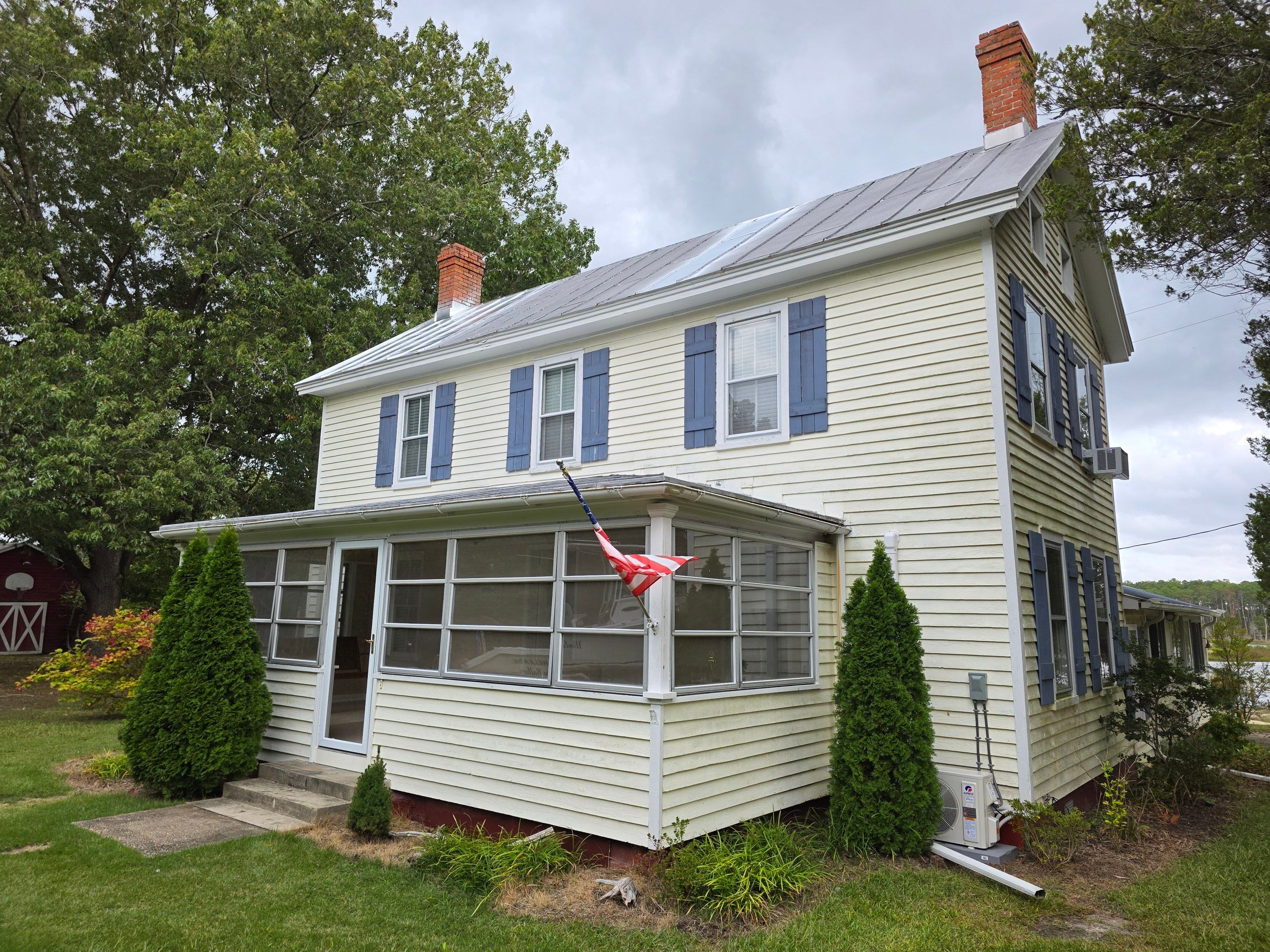 Waterfront Exterior Renovation in Port Haywood by Cade Construction