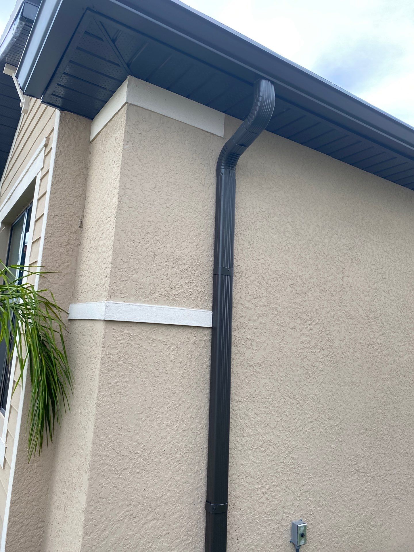 Brown Seamless Gutters for Homes in Fort Myers by Gutter Professors