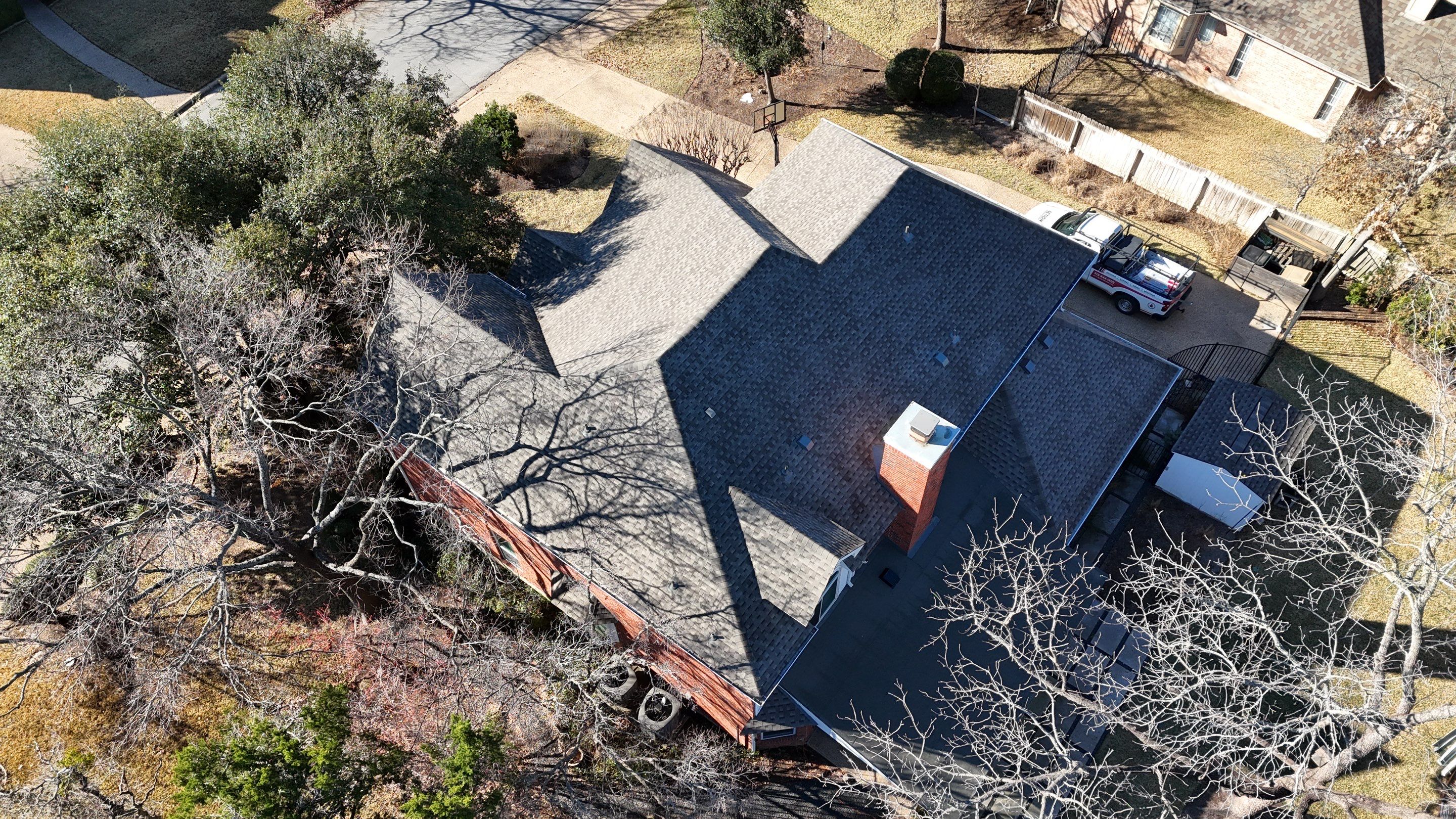 Residential Roof Replacement using GAF - Armorshield ll - Weathered Wood by Action Exteriors Austin