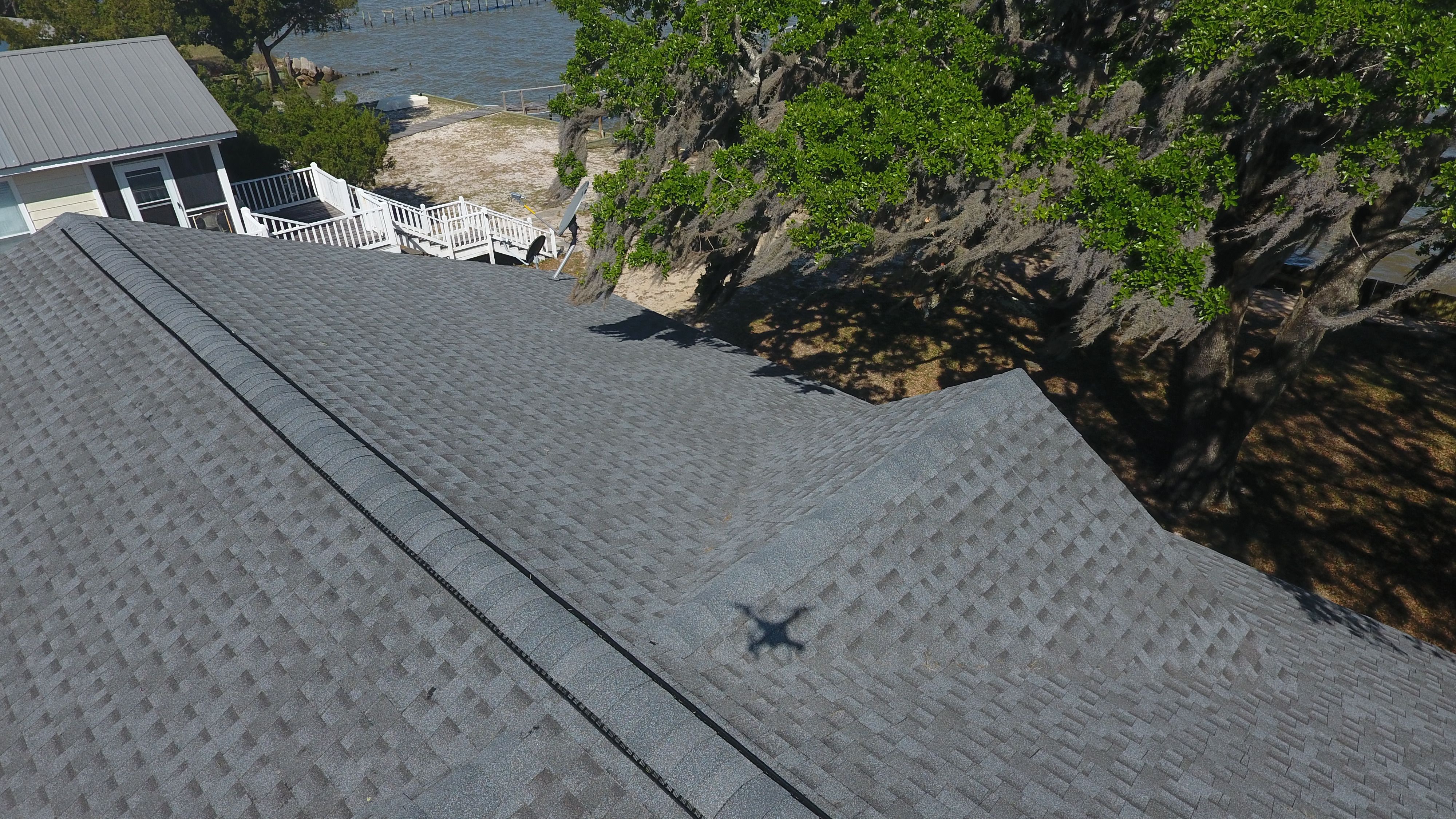 Residential Roofing Installation using Roof Replacement by American Roofing & Construction LLC