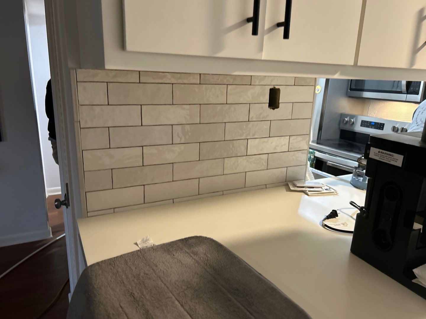 Brick pattern tiles for a bathroom and kitchen by Footprints Floors of Nashville