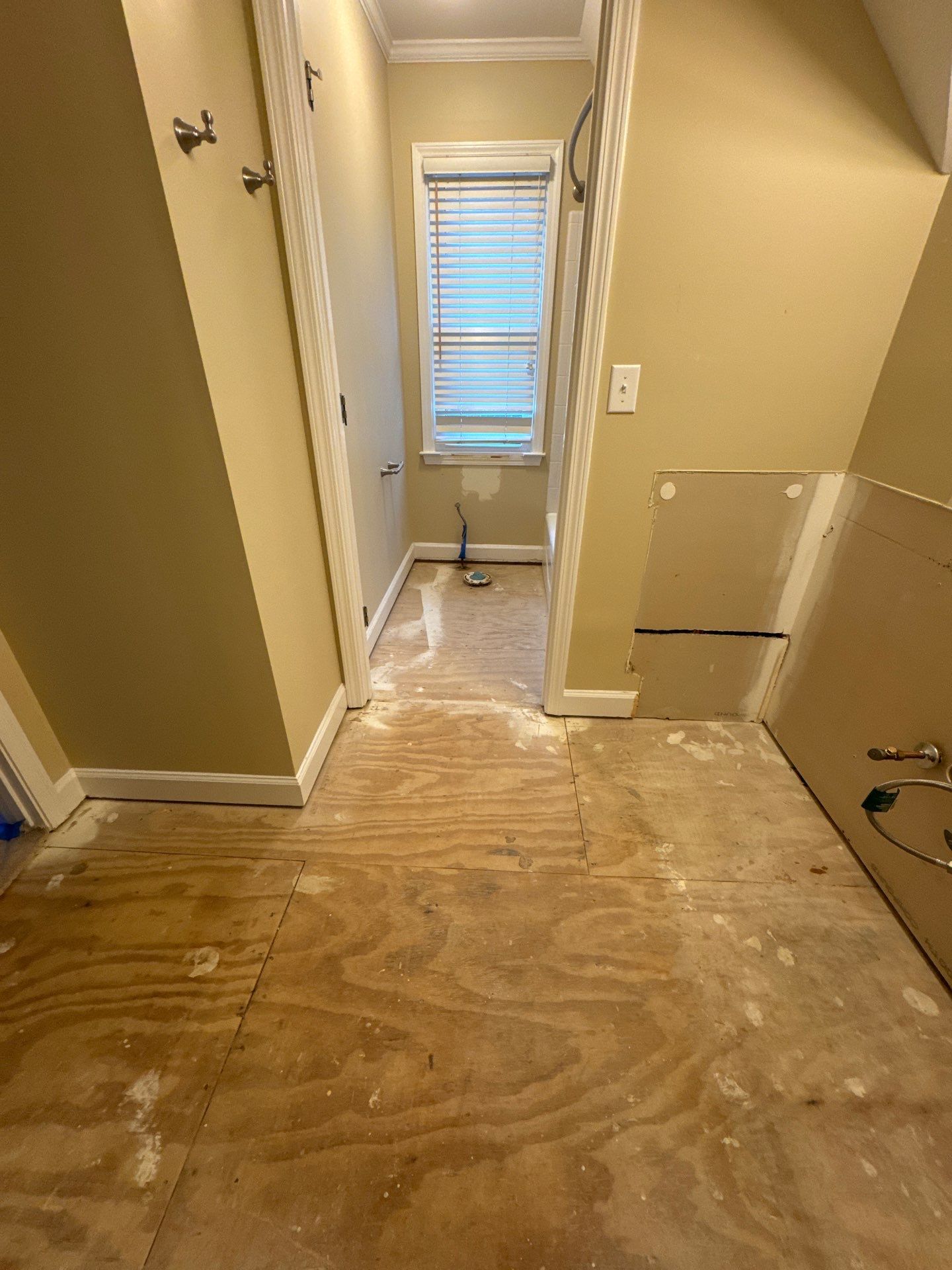 Marietta Bathroom and Laundry Room Floor and Vanity Remodel by Swift Home Renovations